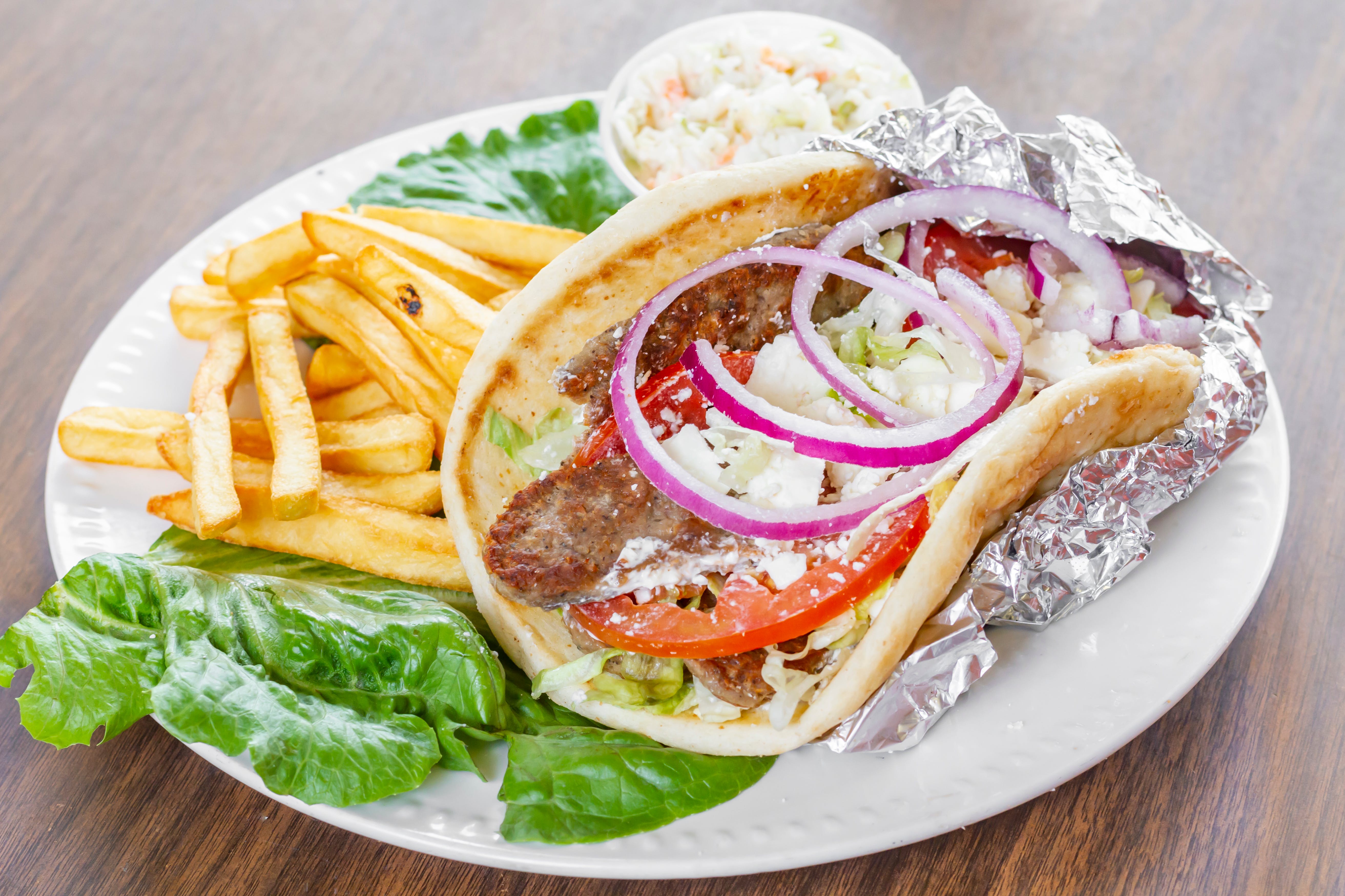 Order Gyro on Pita Sub - 8" food online from Happy House Pizzeria store, Deale on bringmethat.com