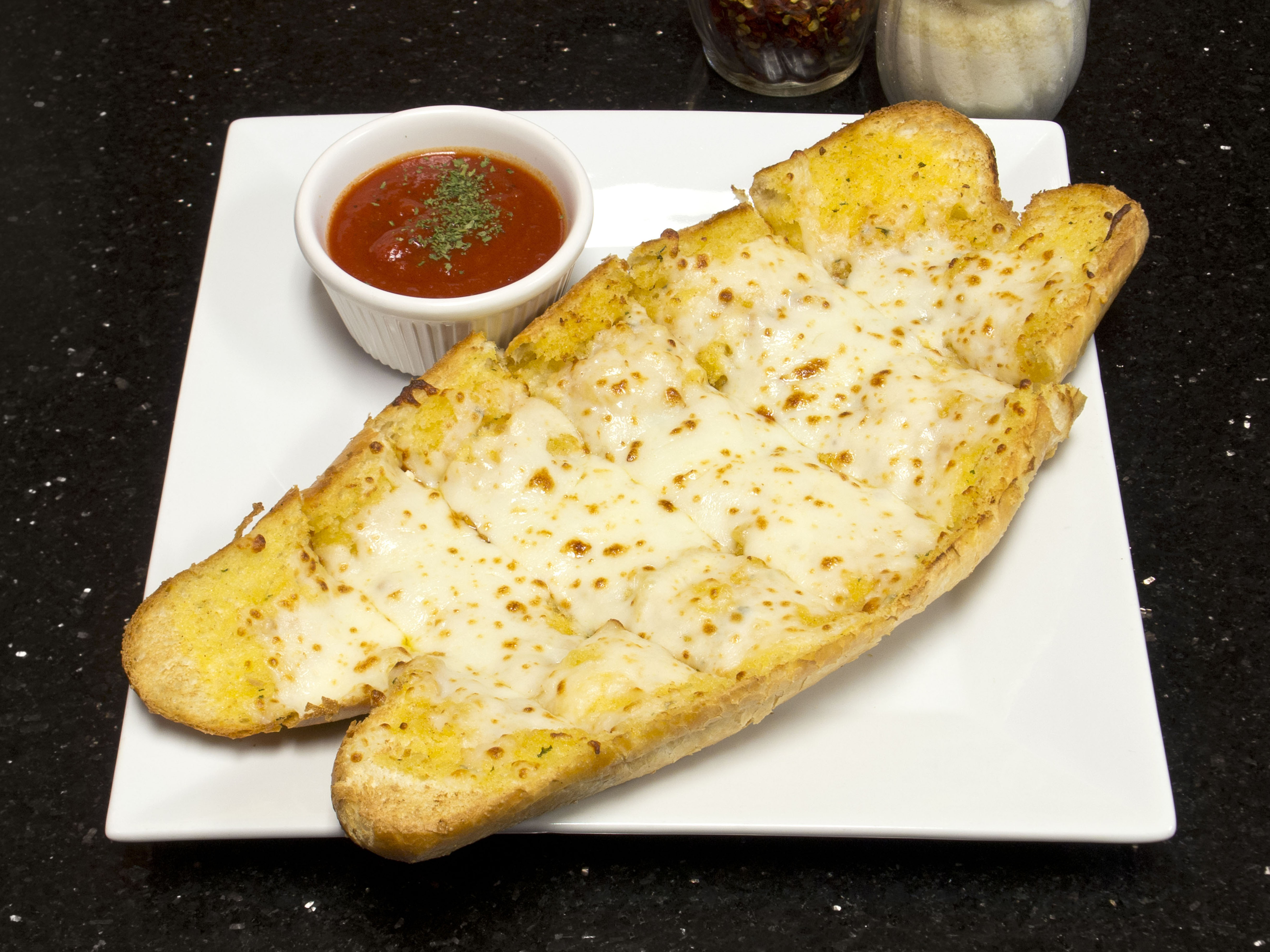Order Garlic Cheese Bread food online from NY Pizzeria store, Arlington on bringmethat.com