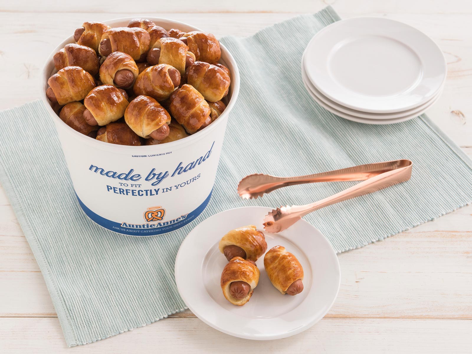 Order Mini Pretzel Dogs Bucket food online from Auntie Anne store, Coralville on bringmethat.com