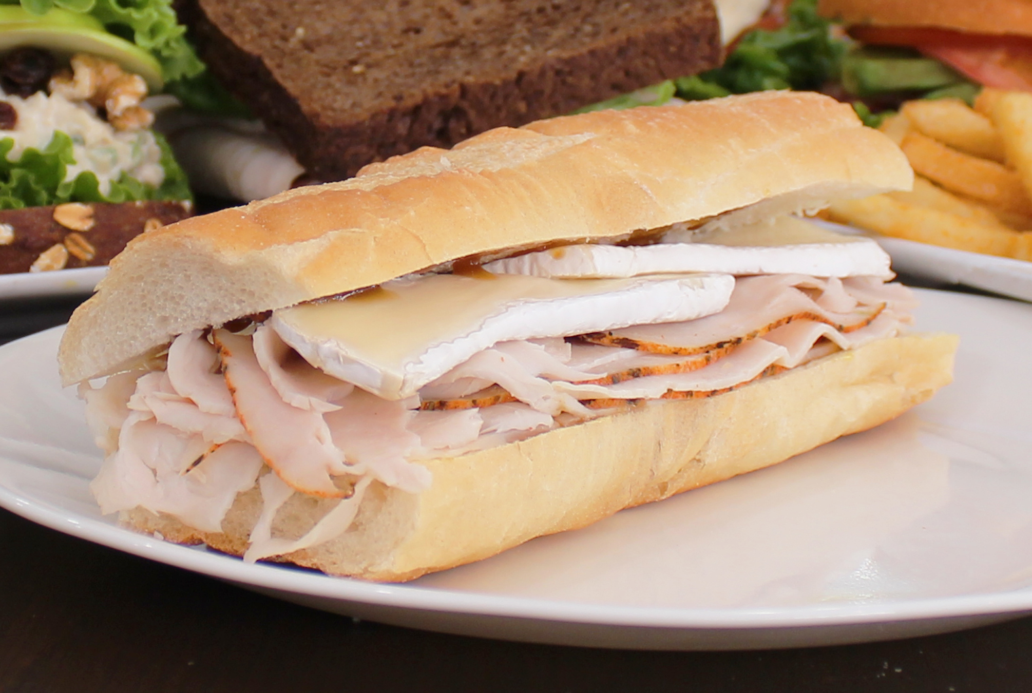 Order M10. Smoked Turkey and Brie Sandwich food online from Green Cafe store, New York on bringmethat.com