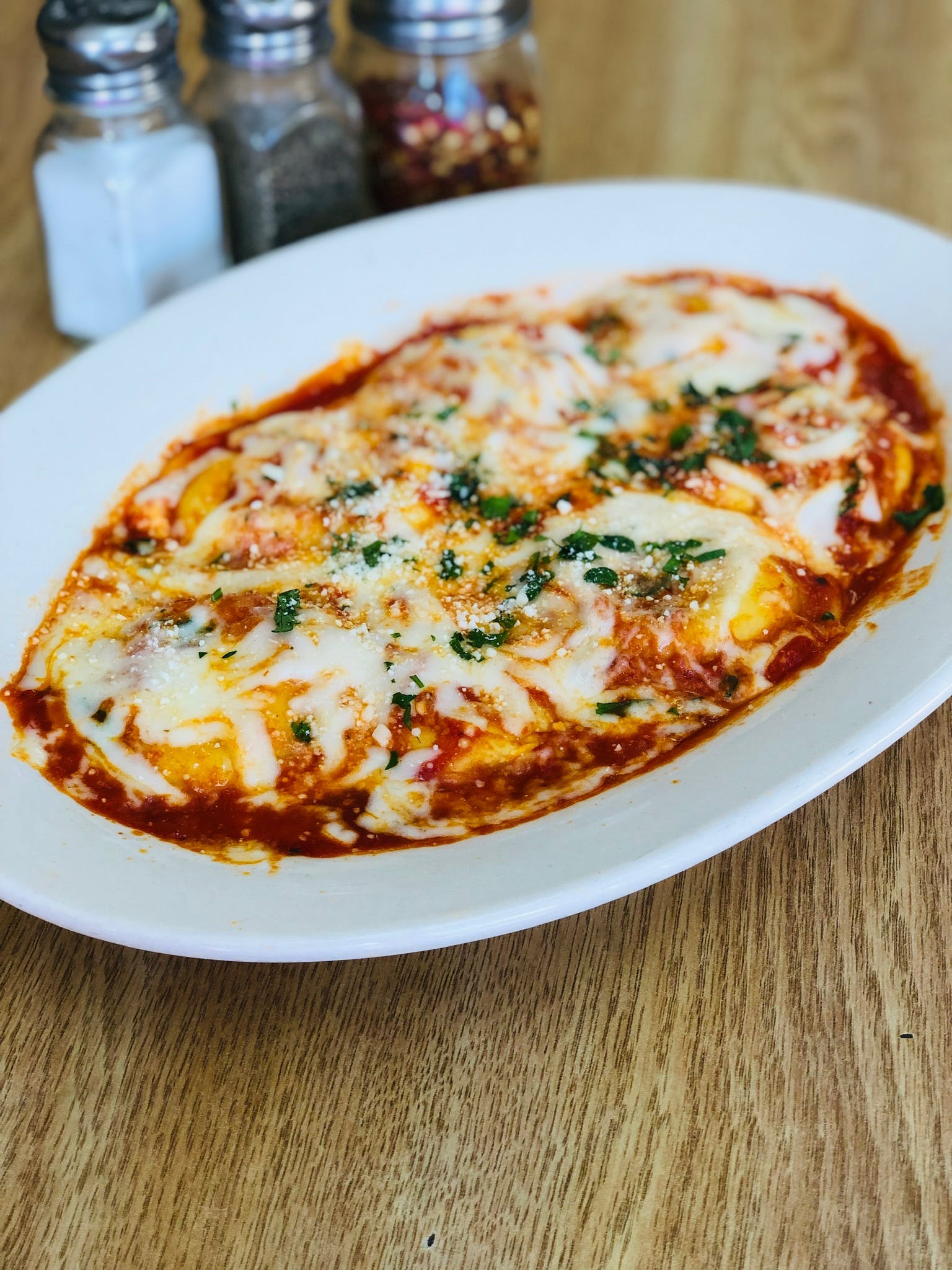 Order Baked Ravioli - Pasta food online from Nonna Rosa Pizzeria store, Norristown on bringmethat.com