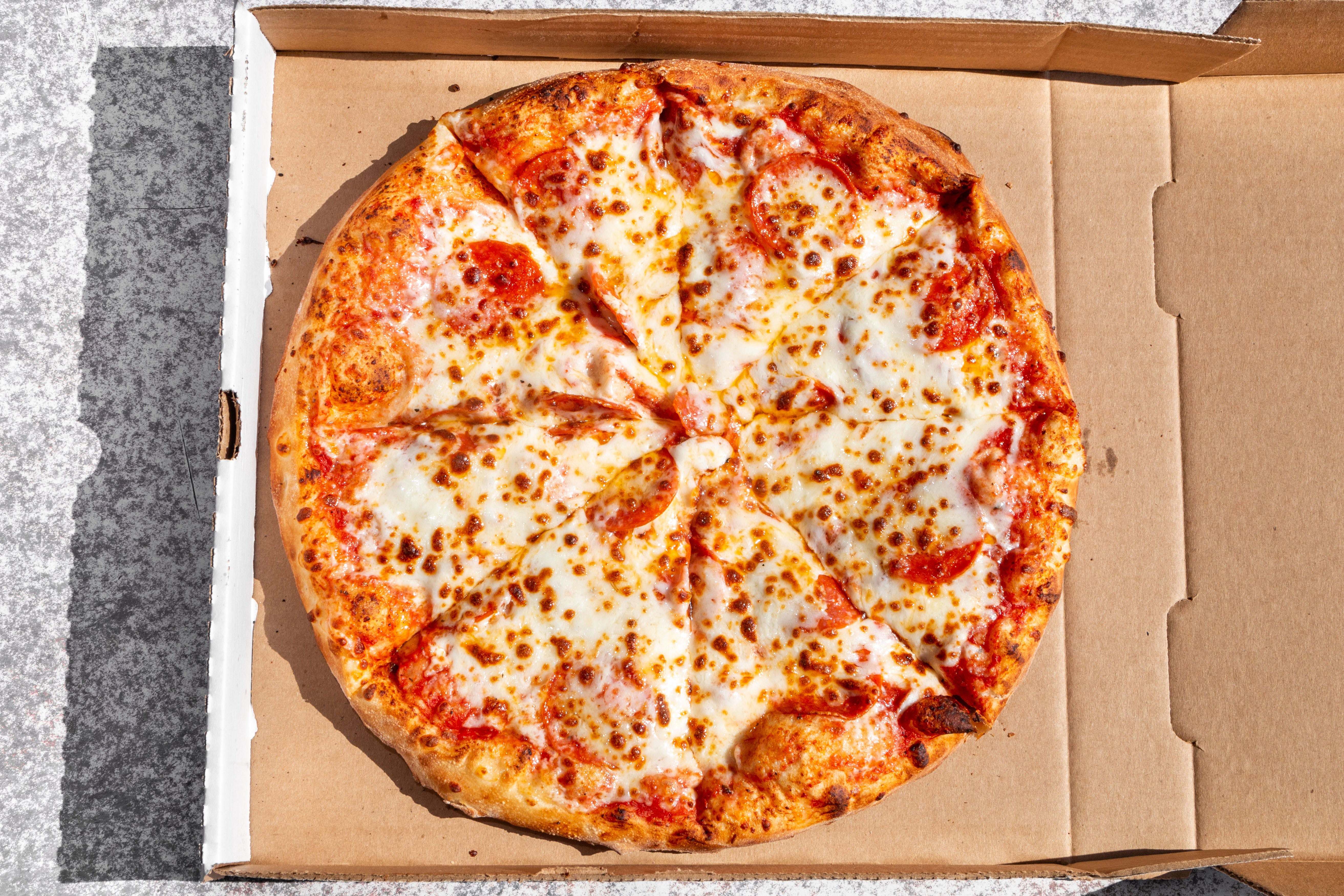Order Cheese Pizza - Small food online from Pizzamania store, Los Angeles on bringmethat.com