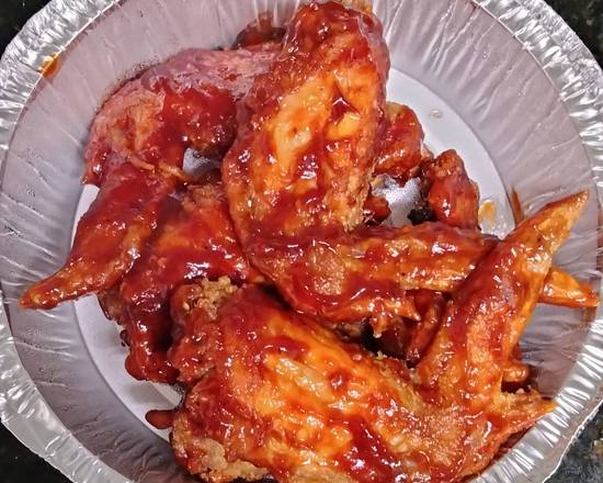 Order BBQ wings (6pcs) food online from AGAPE KITCHEN & PRALINES store, Humble on bringmethat.com