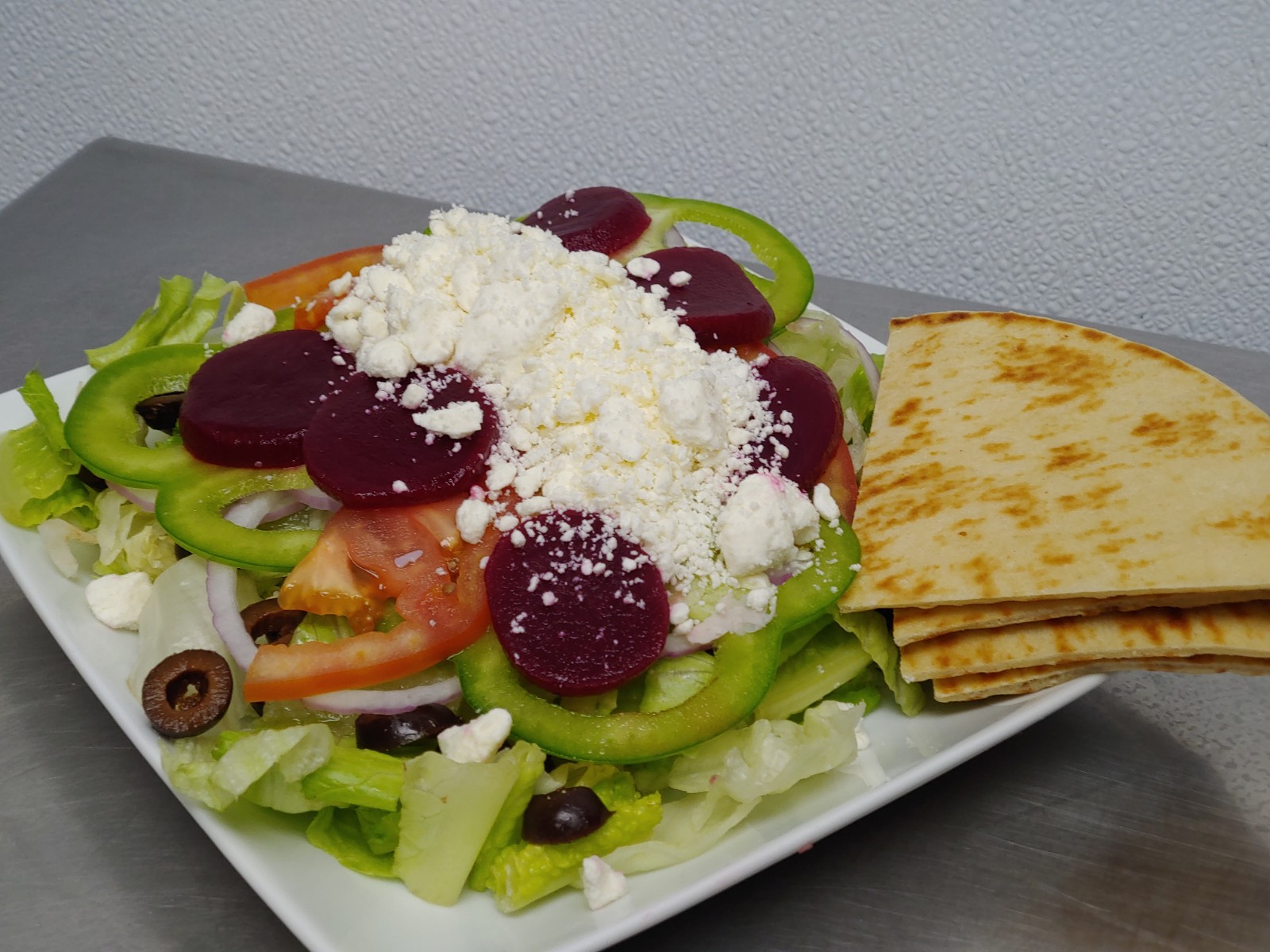 Order Greek Salad food online from Amazing Deli store, Midland on bringmethat.com