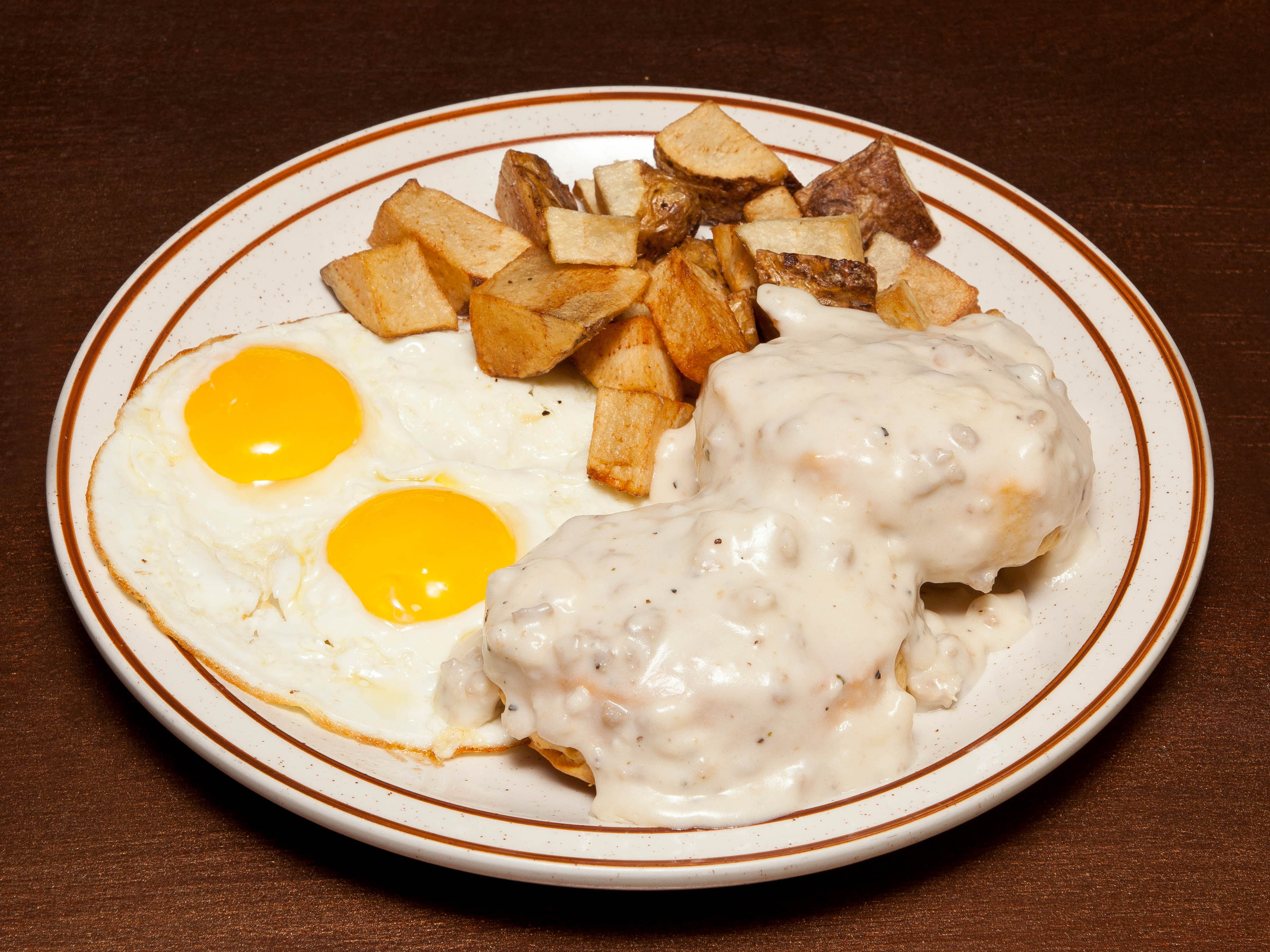 Order The Divine Biscuit and Gravy food online from Divine Eatery store, Las Vegas on bringmethat.com