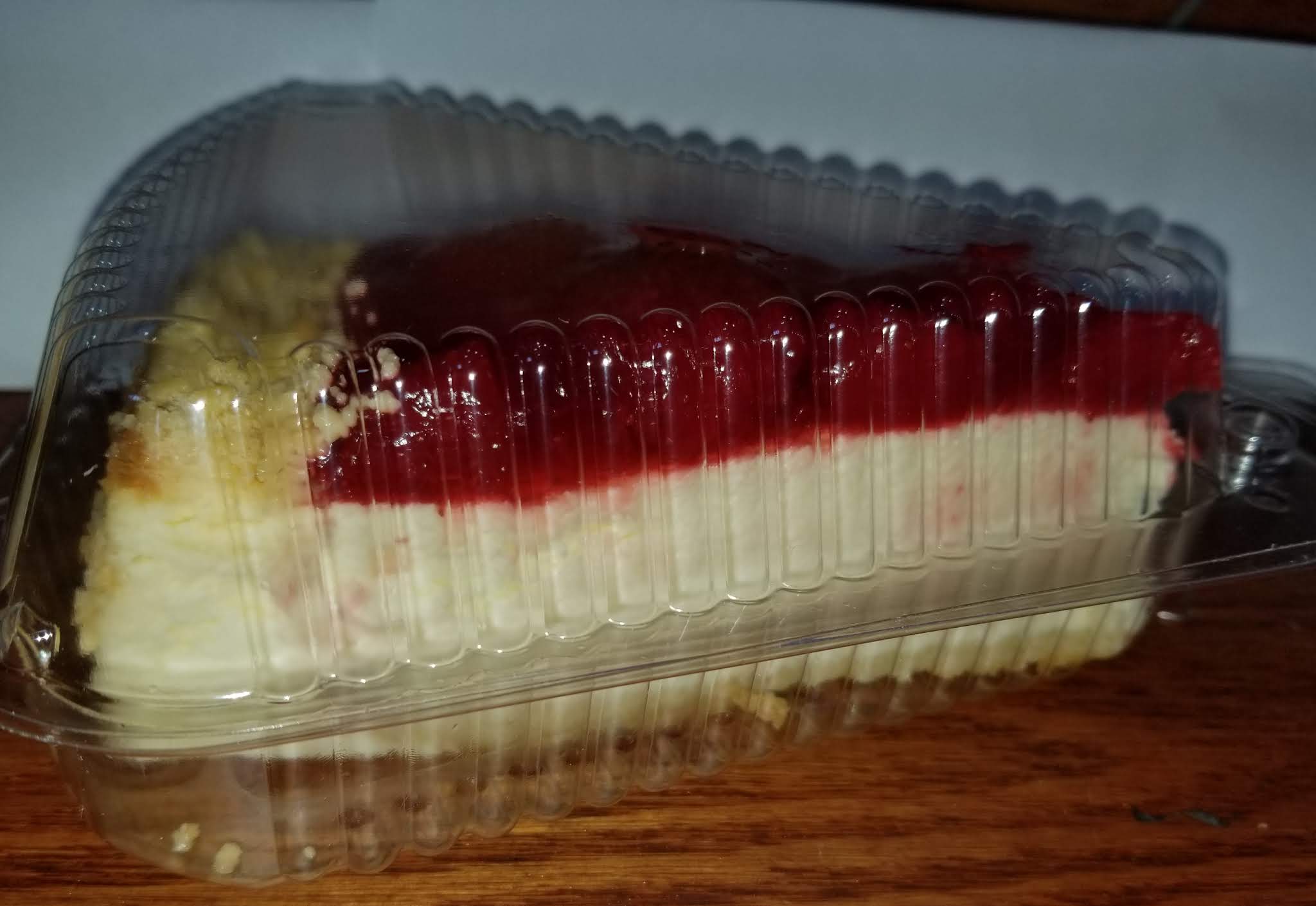 Order Strawberry Cheesecake food online from Amsterdam Deli store, New York on bringmethat.com