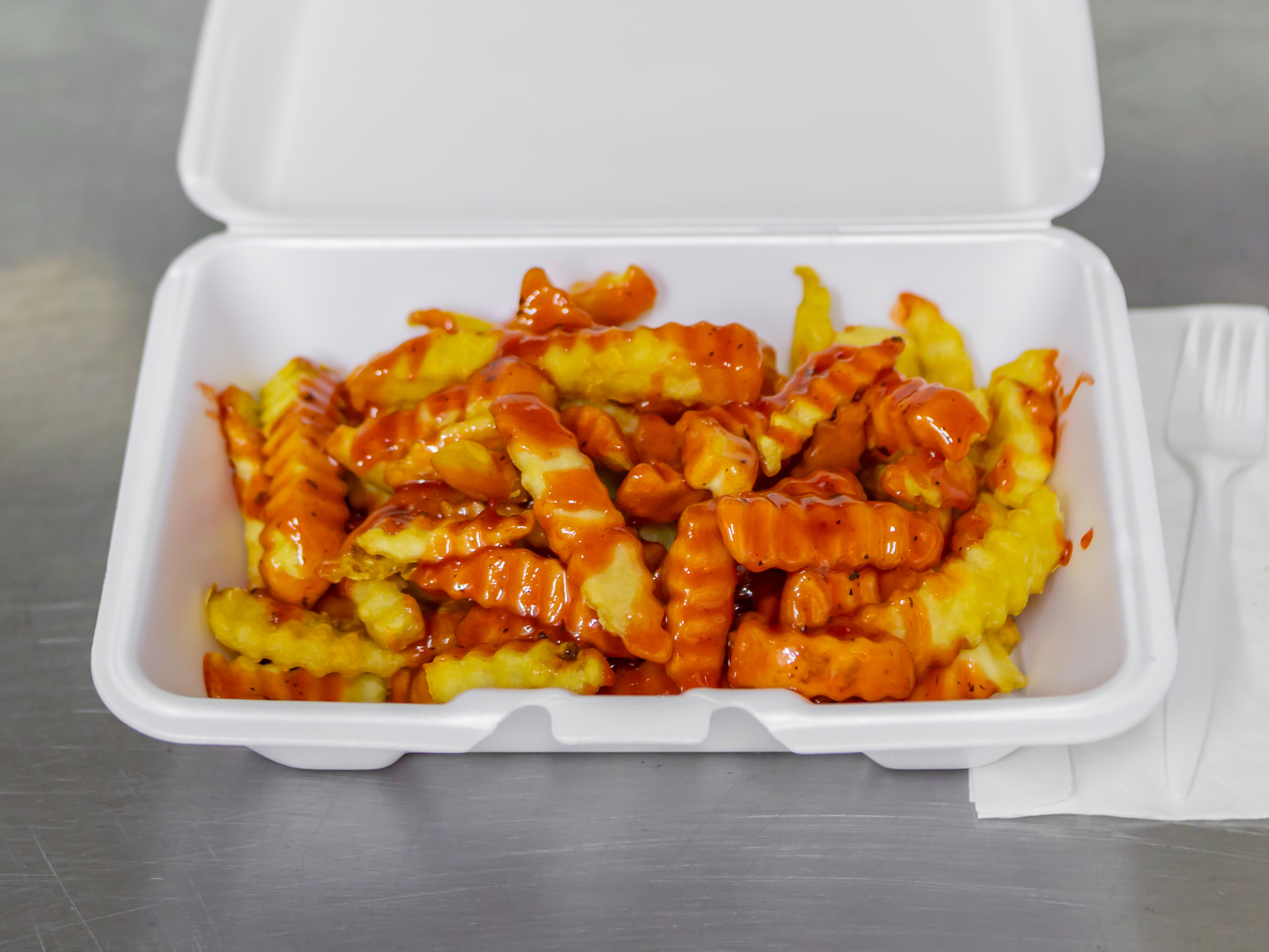 Order BBQ Fries food online from Uptown Bbq store, Detroit on bringmethat.com