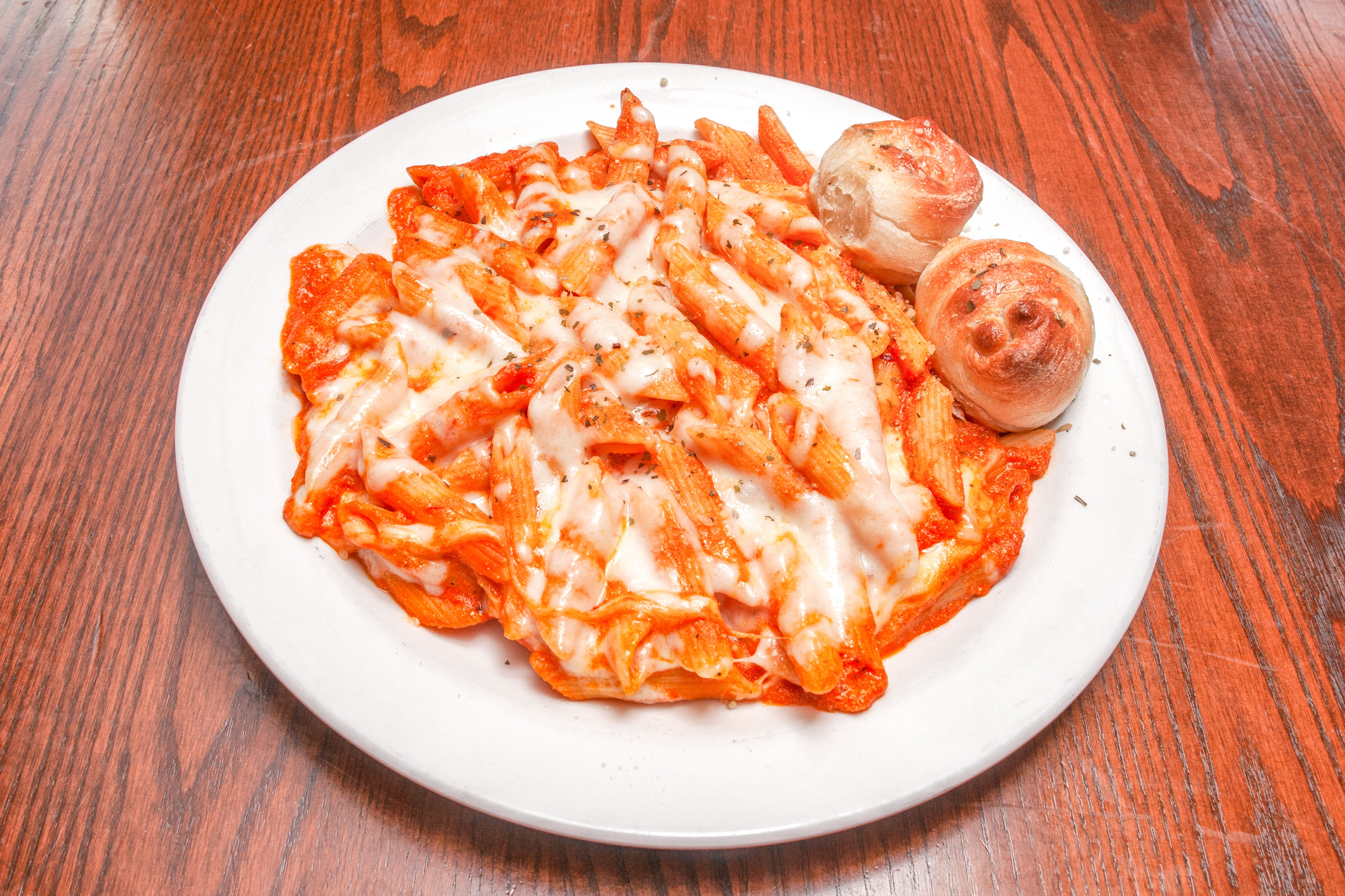 Order Baked Ziti - Pasta food online from Primo Pizza Ny Style store, Cary on bringmethat.com