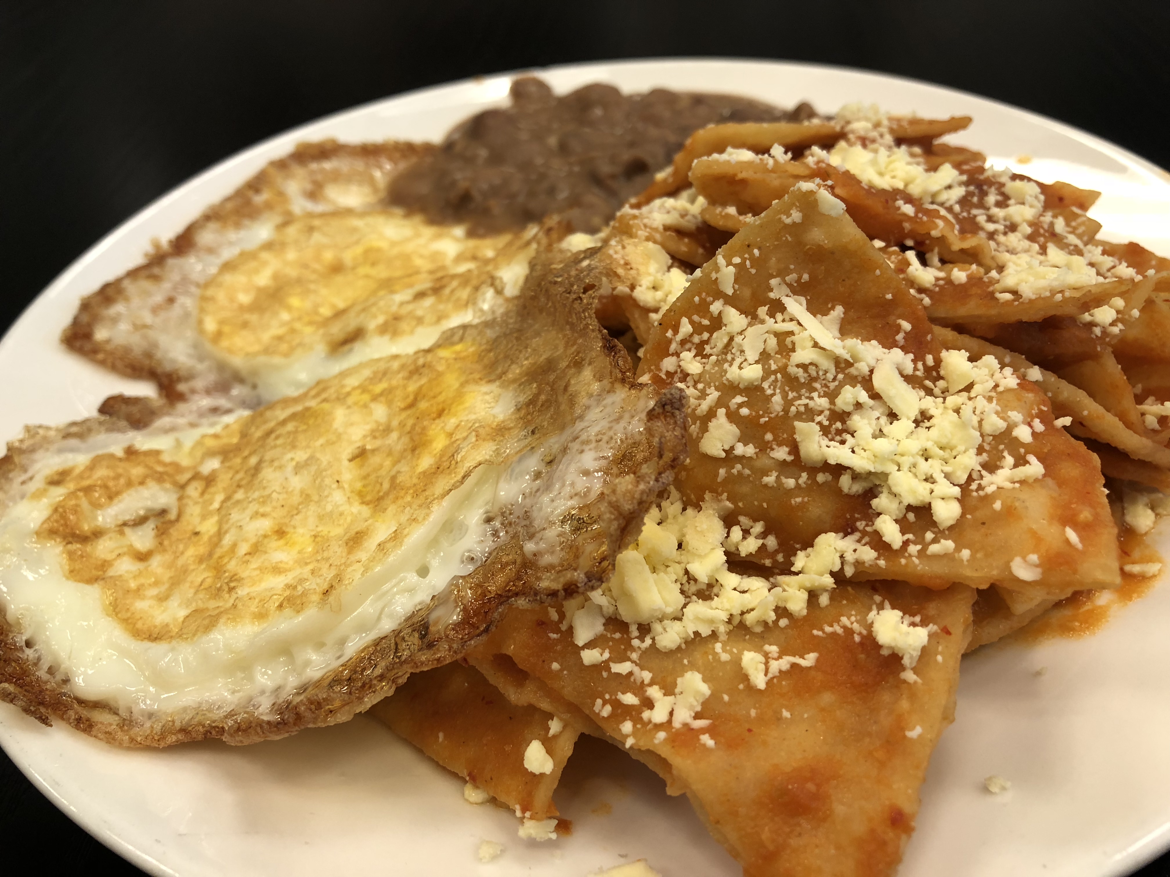 Order RED CHILAQUILES PLATE food online from La Cocinita store, Baldwin Park on bringmethat.com
