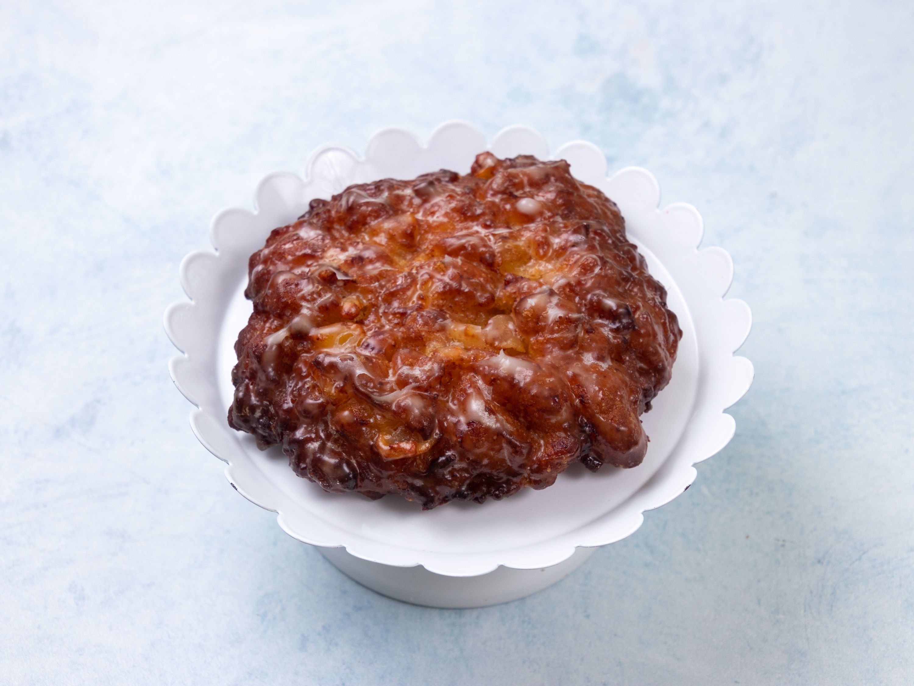 Order Apple Fritter food online from Joy Donuts store, Dacula on bringmethat.com