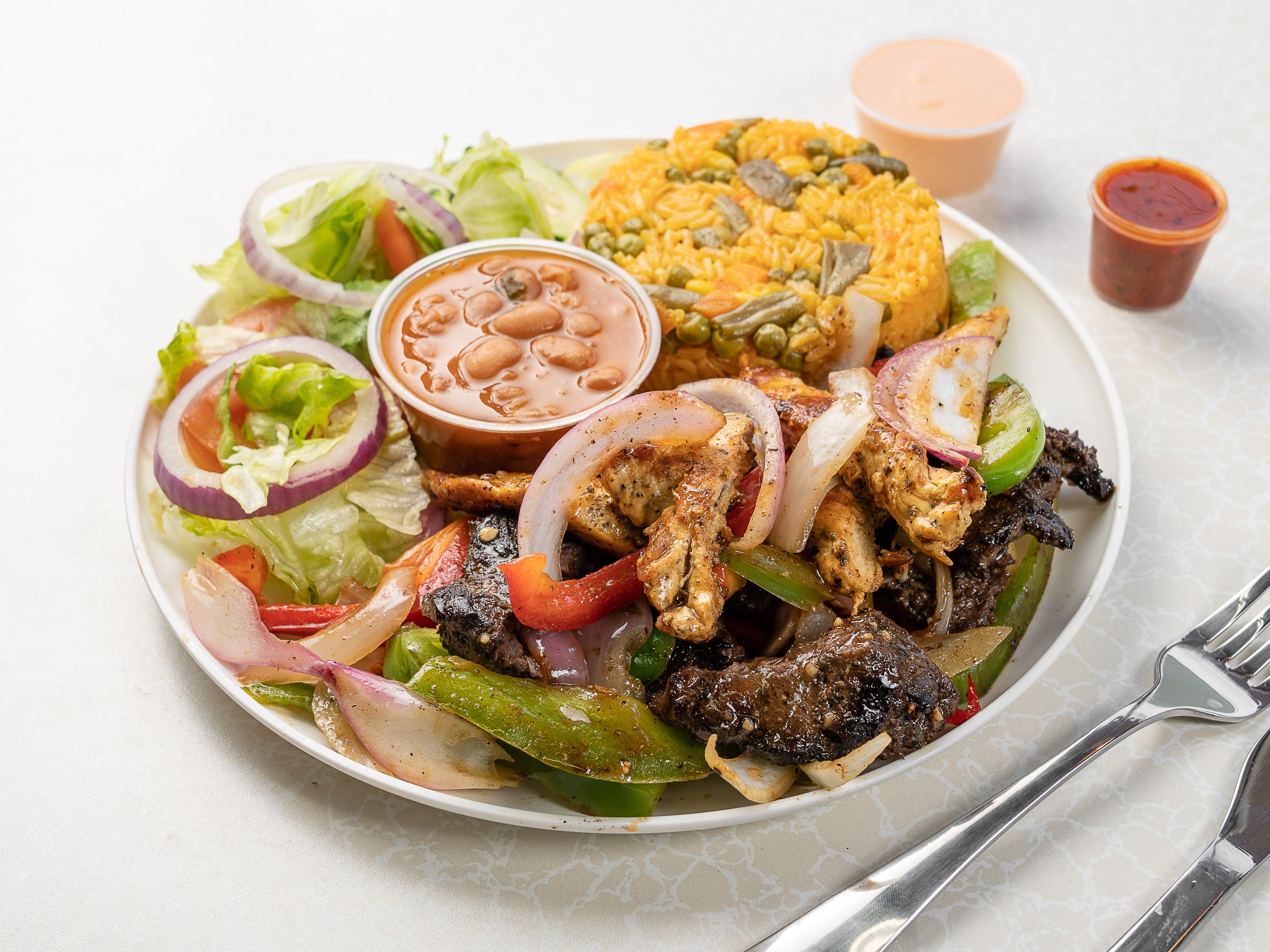 Order Grilled Steak and Chicken Platter (pluma y pelo) food online from 270 Deli NY store, Hempstead on bringmethat.com