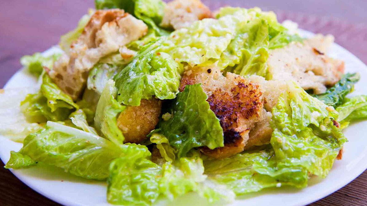 Order Caesar Salad food online from Tastee Grill store, San Mateo on bringmethat.com