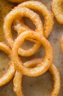 Order Beer-Battered Onion Rings food online from New York Pizza & Family Restaurant store, Tannersville on bringmethat.com