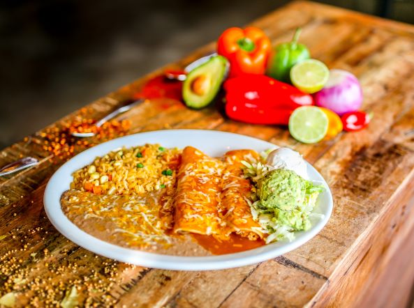 Order Enchiladas Rojas food online from Miguels Mexican Bar And Grill store, Colorado Springs on bringmethat.com