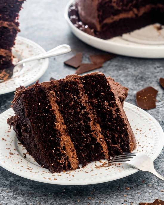 Order CHOCOLATE CAKE (SLICE ) food online from Flynn's Eats store, Richfield on bringmethat.com
