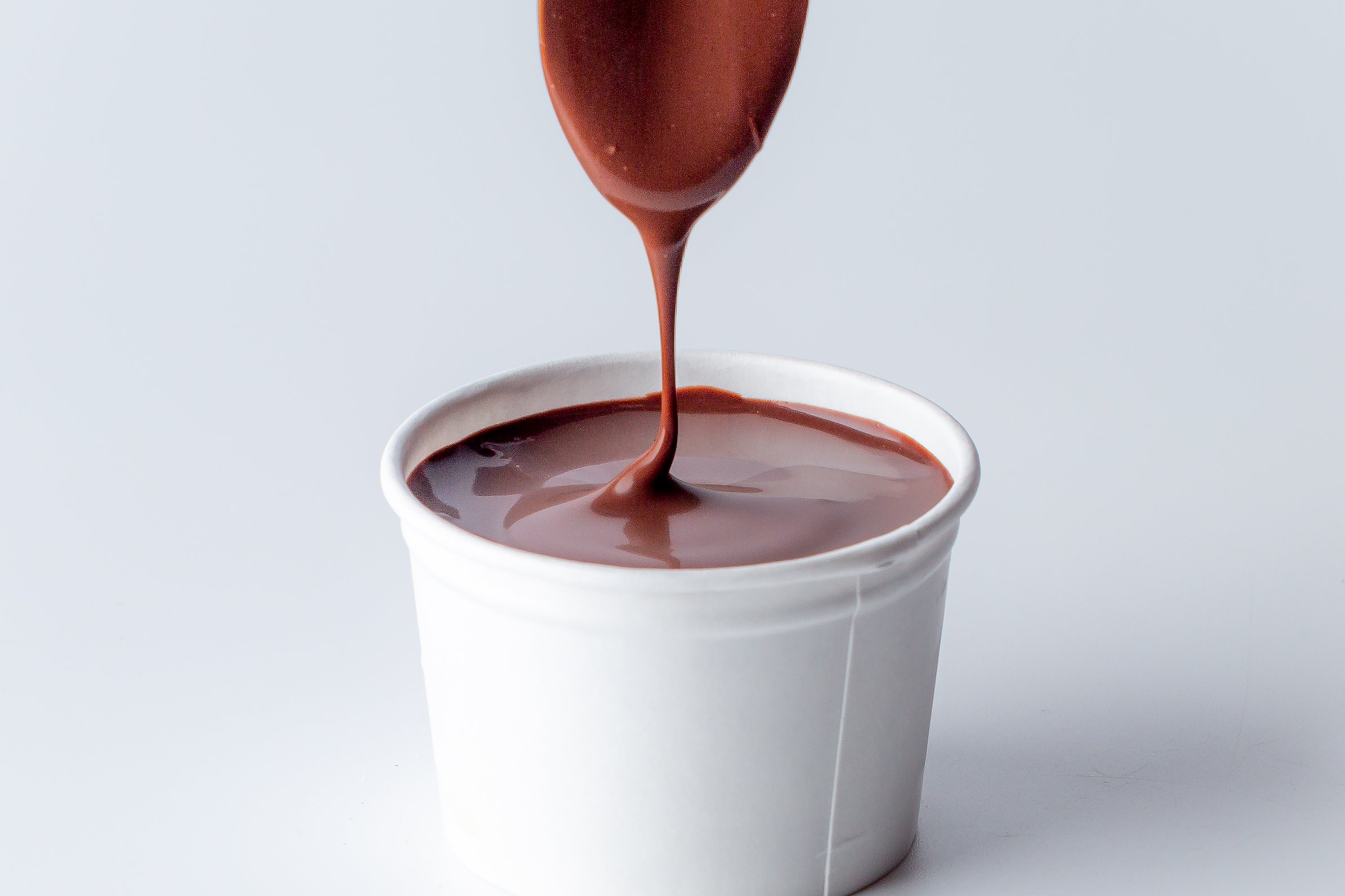Order Side Of Chocolate Sauce food online from Smitten Ice Cream store, San Francisco on bringmethat.com