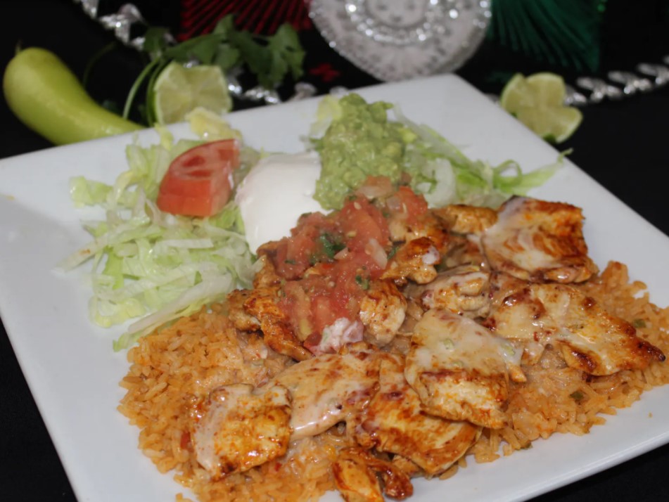 Order Arroz con Pollo food online from Don Ramon Mexican Restaurant store, Merrimack on bringmethat.com