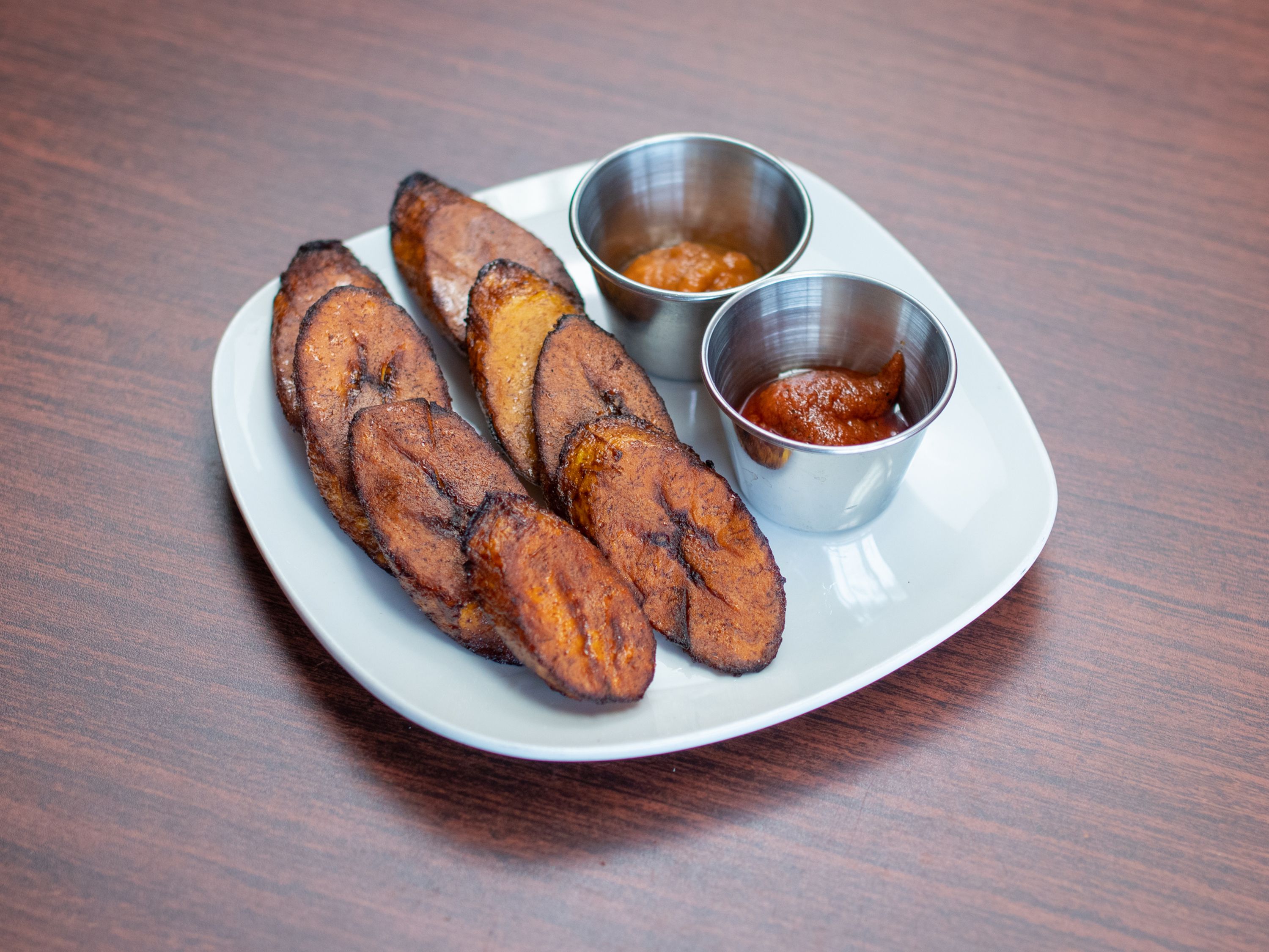 Order Fried Plantains food online from Chaima Cuisine store, Omaha on bringmethat.com