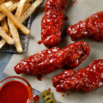 Order 4 Sticky Chicken Fingers food online from Tgi Fridays store, Rockville Centre on bringmethat.com