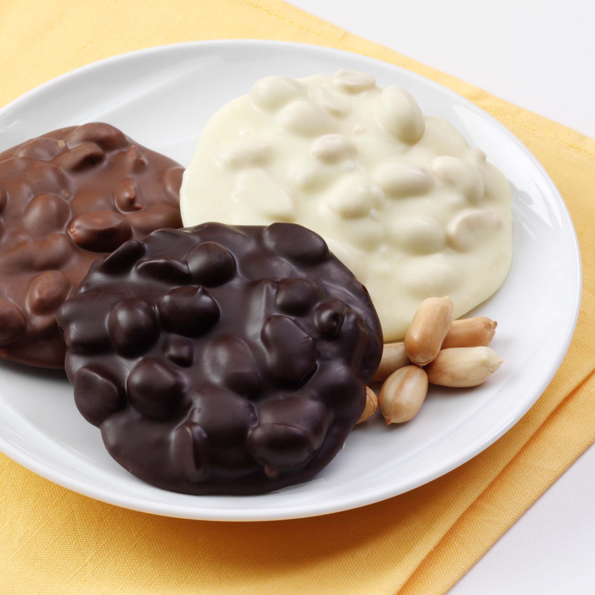Order Peanut Clusters food online from Russell Stover Chocolates store, Omaha on bringmethat.com