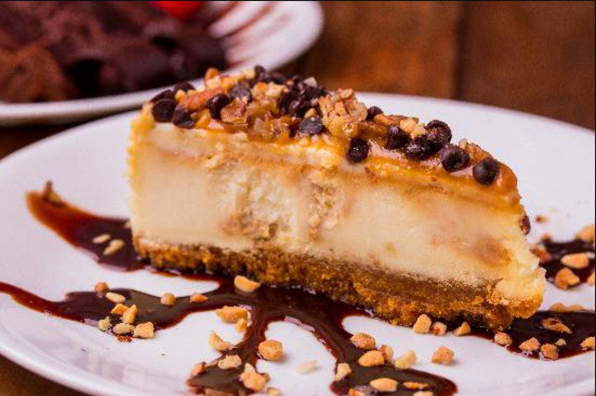 Order Turtle Cheesecake - Dessert food online from Pizza Fino store, Houston on bringmethat.com