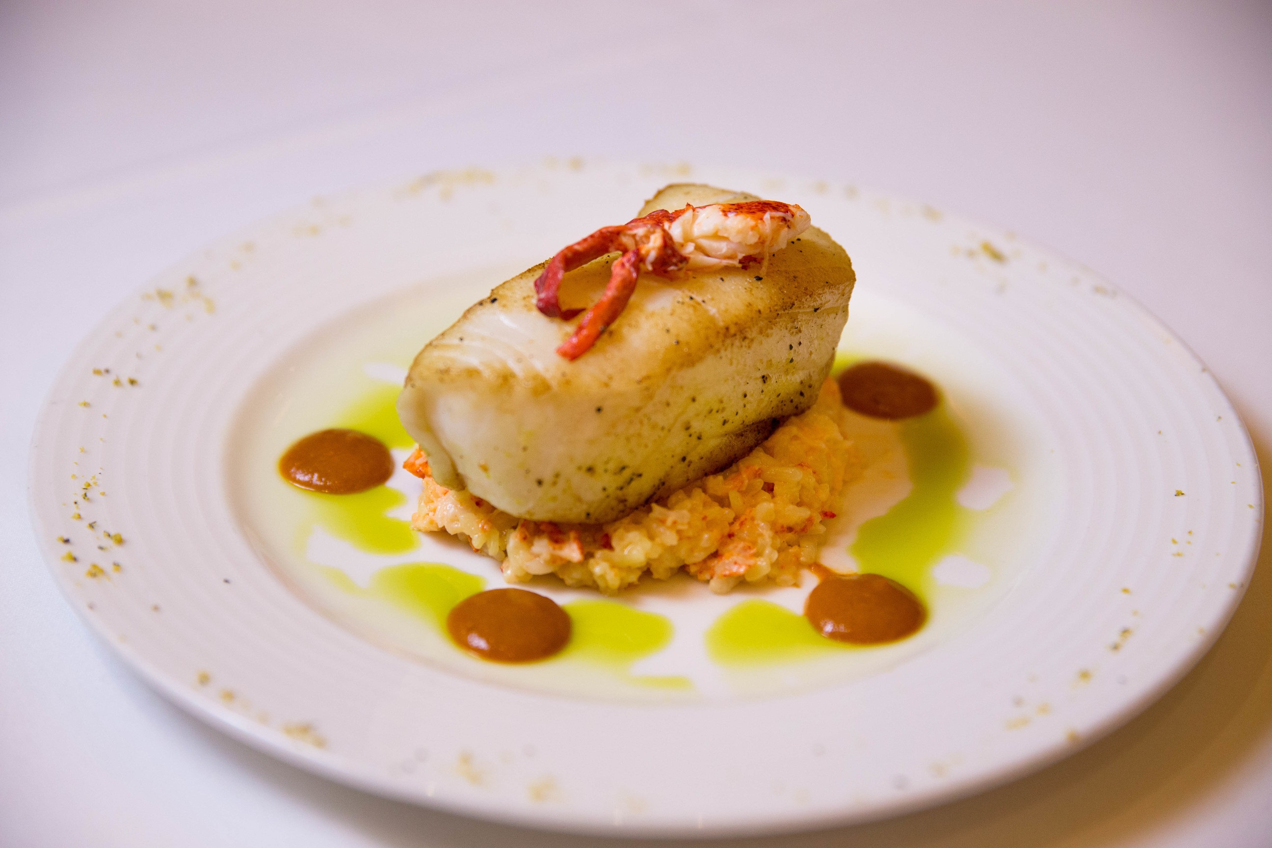 Order Oven Roasted Seabass food online from Kirby Prime Steakhouse store, The Woodlands on bringmethat.com