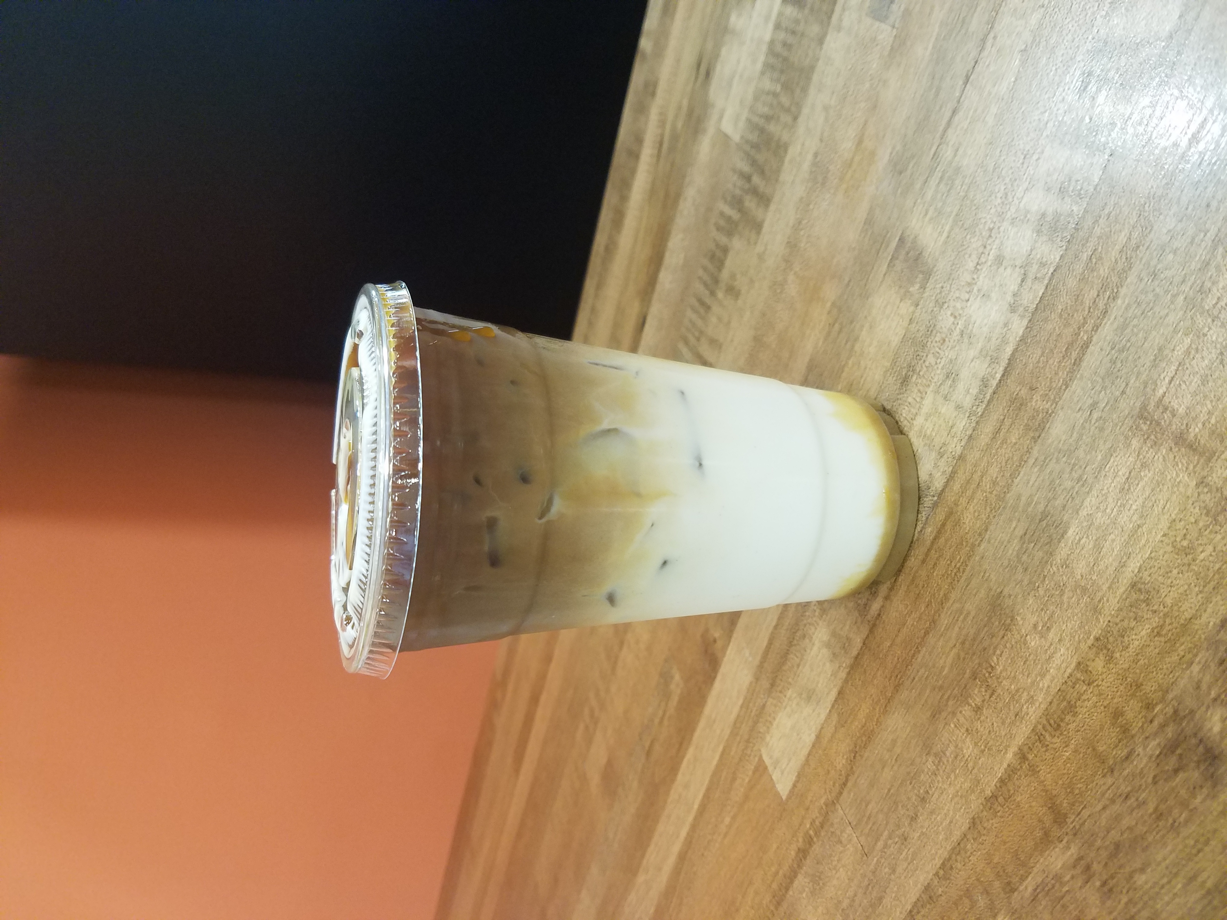 Order Caramel Iced Macchiato food online from Torch Wood Cafe store, Philadelphia on bringmethat.com