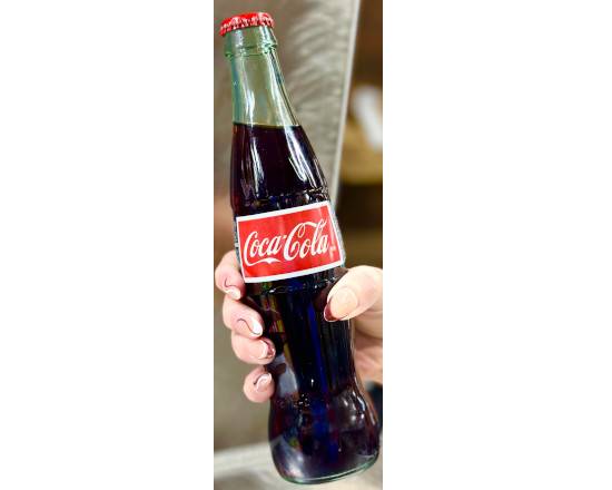 Order GlassMexican Bottled Coke 12oz food online from Lunchbox store, Dearborn Heights on bringmethat.com