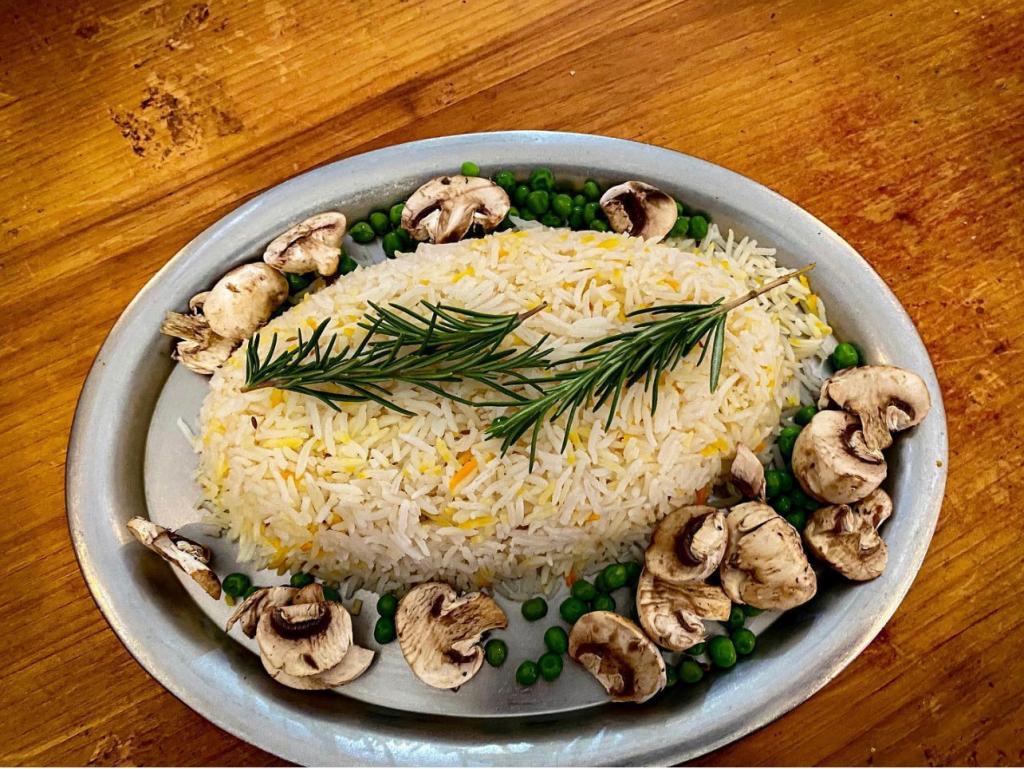 Order Mushroom Pillau Rice food online from Star of India Restaurant store, Little Rock on bringmethat.com