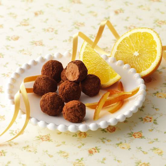 Order Petite Truffe "Orange" food online from Royce' Chocolate store, Las Vegas on bringmethat.com