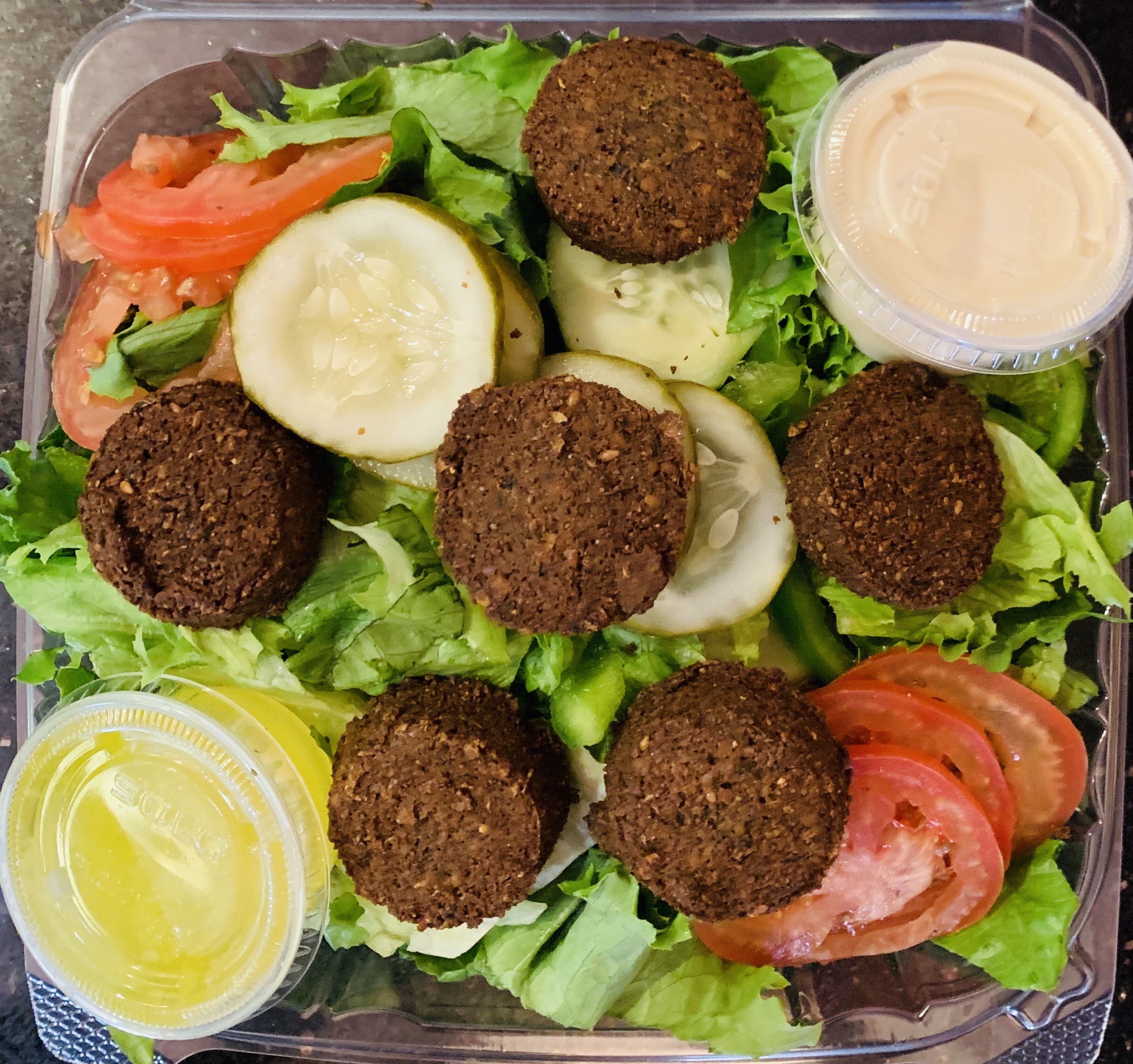 Order Egyptian Falafel Salad food online from Andys Mediterranean Grille store, Cincinnati on bringmethat.com