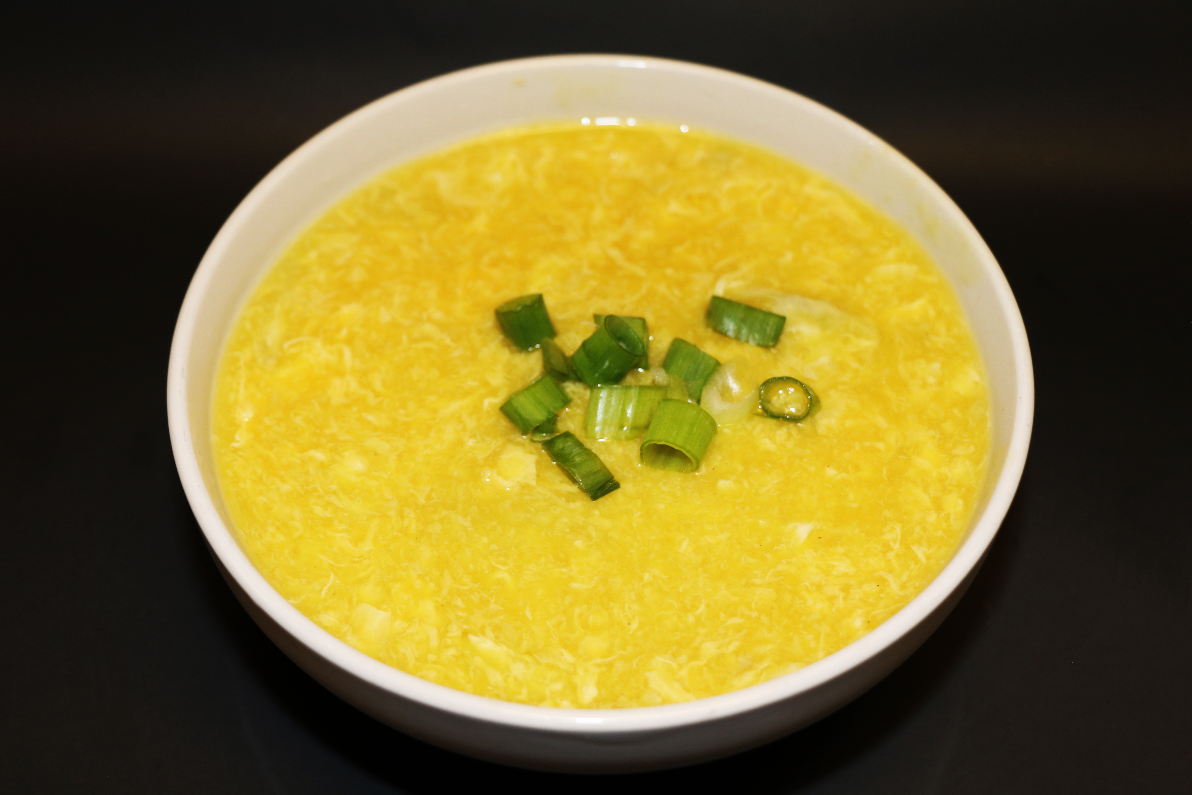 Order 12. Egg Drop Soup 蛋花汤 food online from Yen Ching Chinese Restaurant store, Naperville on bringmethat.com