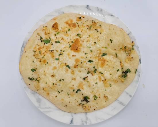 Order Garlic Naan -1 food online from Curry Point 2 Go store, Bellevue on bringmethat.com