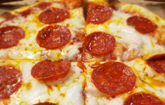 Order Pepperoni Pizza - The Huge Slice 10" - Personal 10" food online from Grecos New York Pizzeria store, Thousand Oaks on bringmethat.com