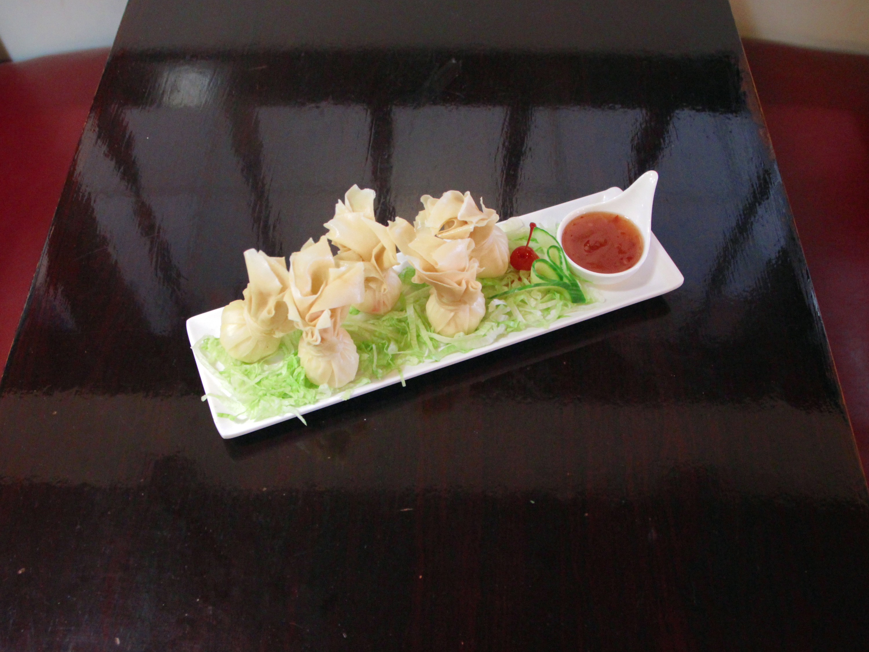 Order 5 Piece Crab Rangoon food online from Sakura Japanese Hibachi & Sushi store, Reynoldsburg on bringmethat.com