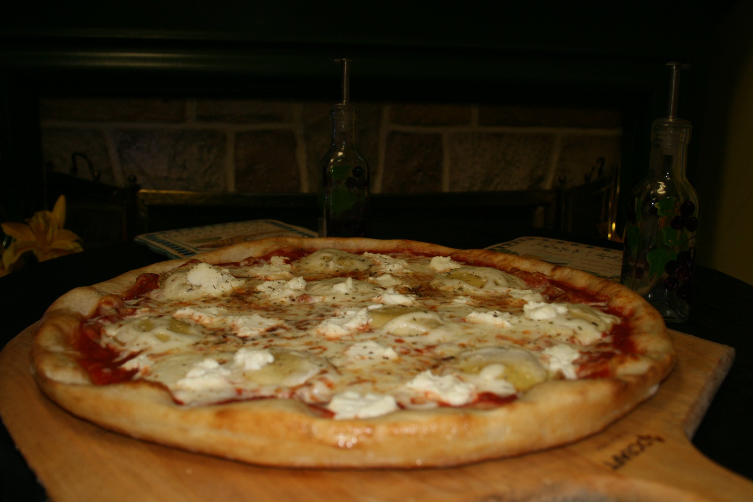 Order Ravioli Pizza - Medium 14" food online from The Dough Boy's Pizzeria store, Baldwinsville on bringmethat.com
