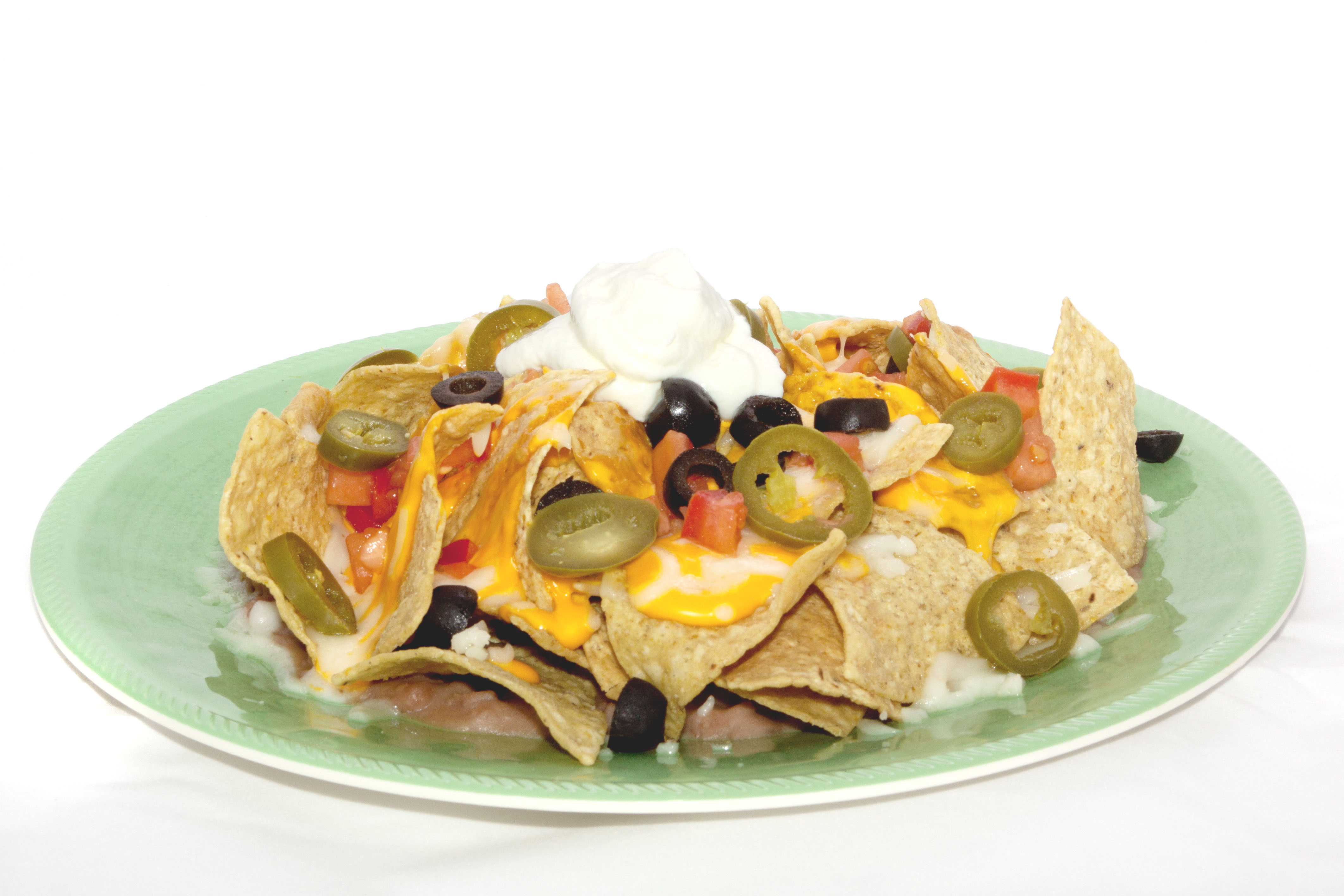 Order Nachos food online from North of The Border Mexican Restaurant store, Bartlett on bringmethat.com