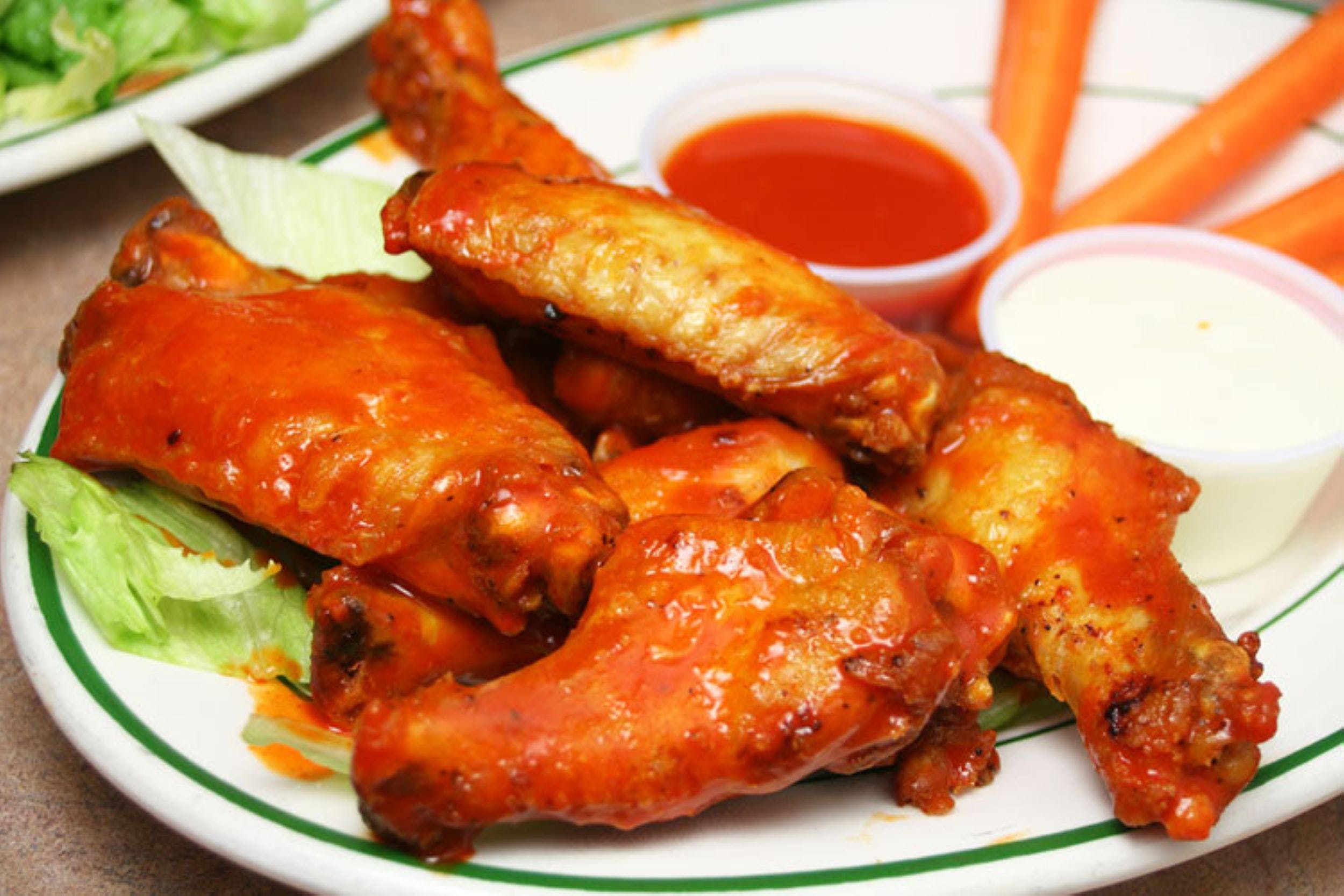 Order Chicken Wings - 8 Pieces food online from Romanzza Pizzeria store, Somerville on bringmethat.com