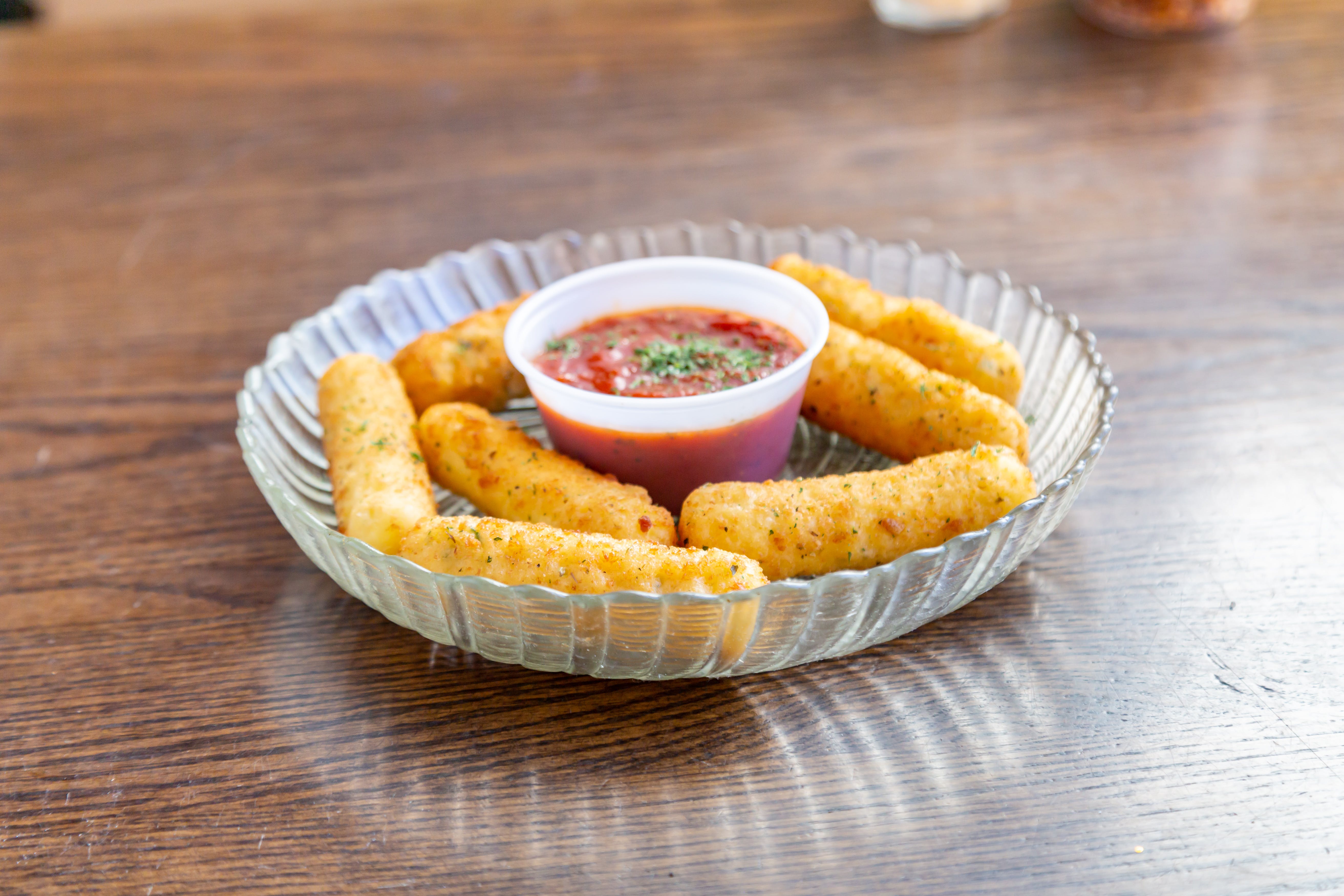Order Mozzarella Sticks - 7 Pieces food online from South Whitney Pizza store, Hartford on bringmethat.com