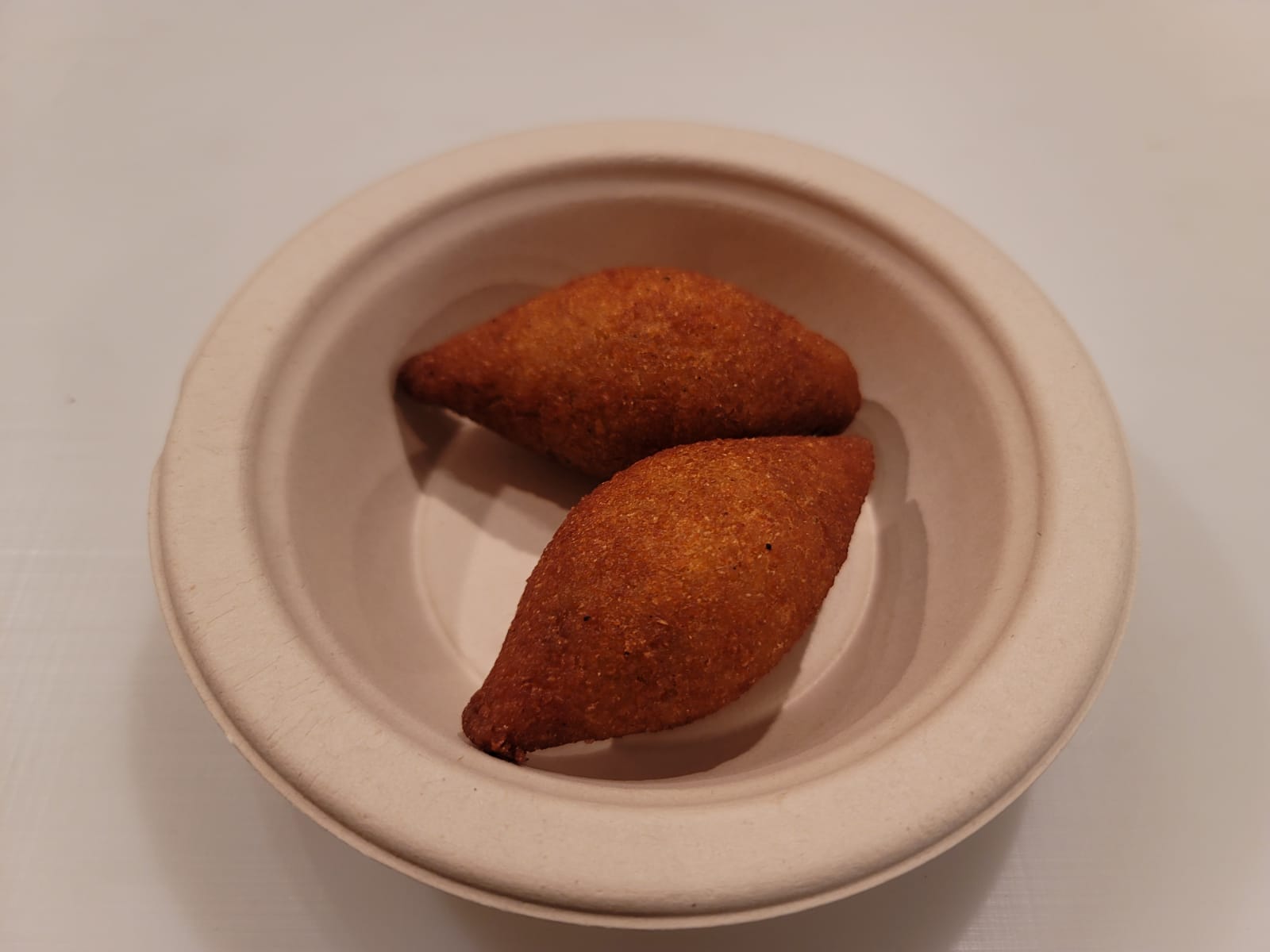 Order Spanich Kibbeh(1 piece) food online from Rosewater Middle Eastern Grill store, Pittsburgh on bringmethat.com