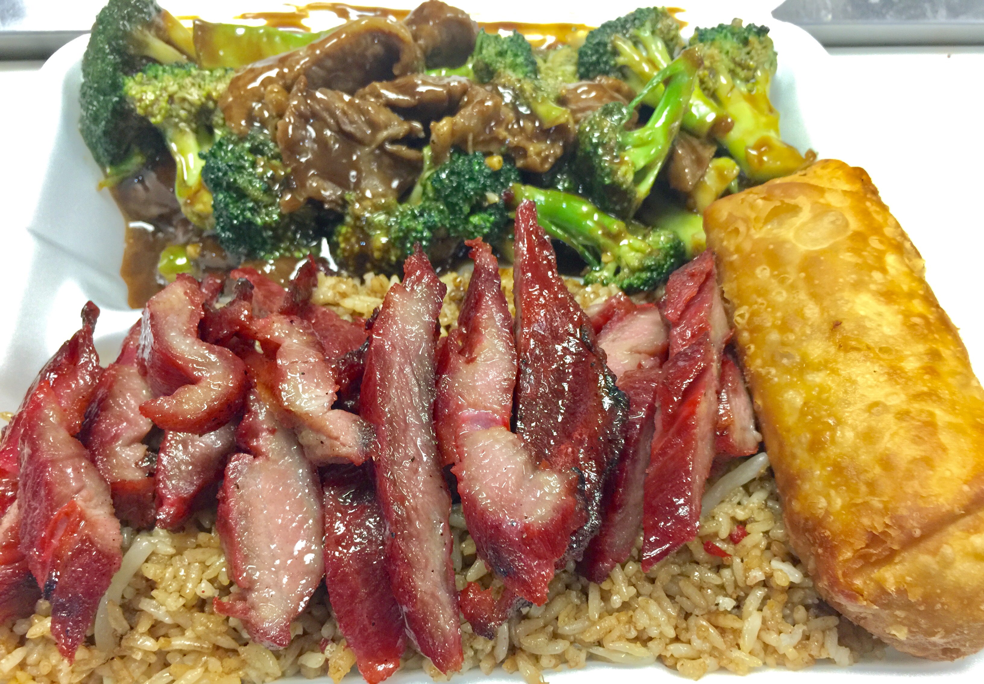 Order D6. Egg Roll, Boneless Ribs, Fried Rice and Beef with Broccoli Combo food online from New Hong Kong Village store, Medford on bringmethat.com