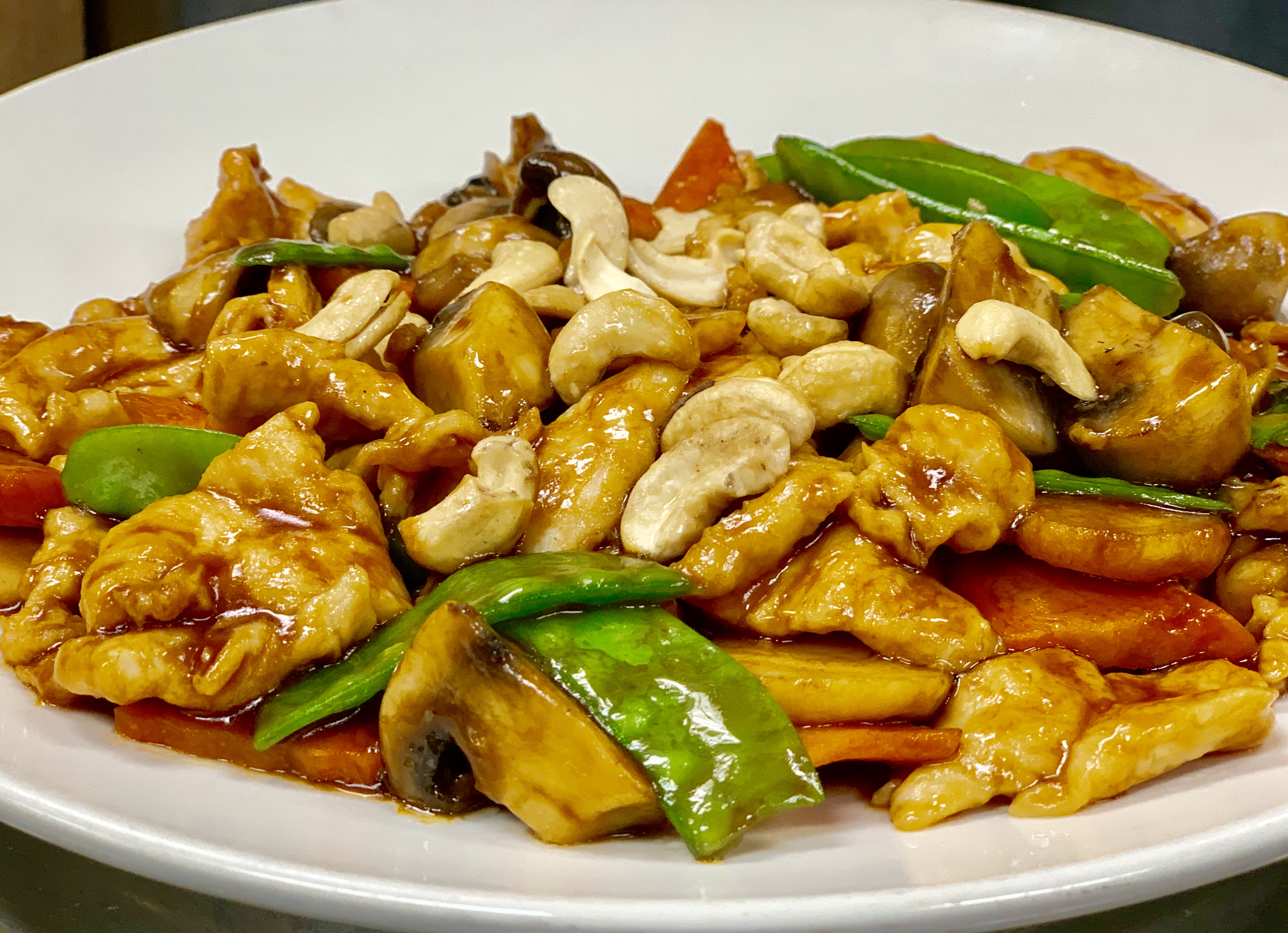 Order Cashew Chicken food online from Red Bowl Asian Bistro store, Cary on bringmethat.com