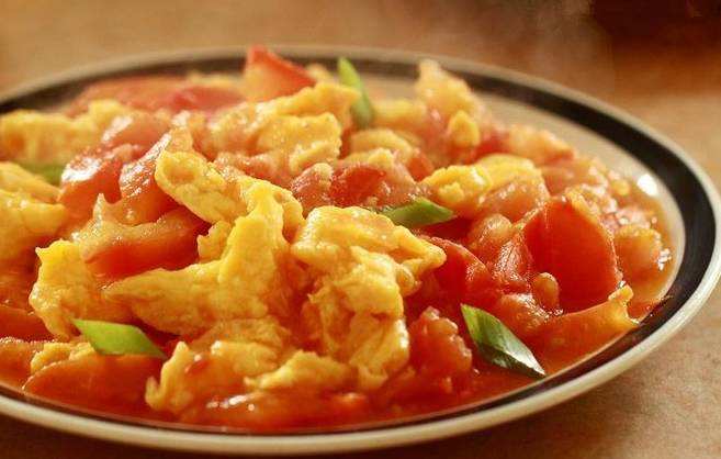Order Scrambled Eggs w. Tomato food online from Spice Workshop store, Centereach on bringmethat.com