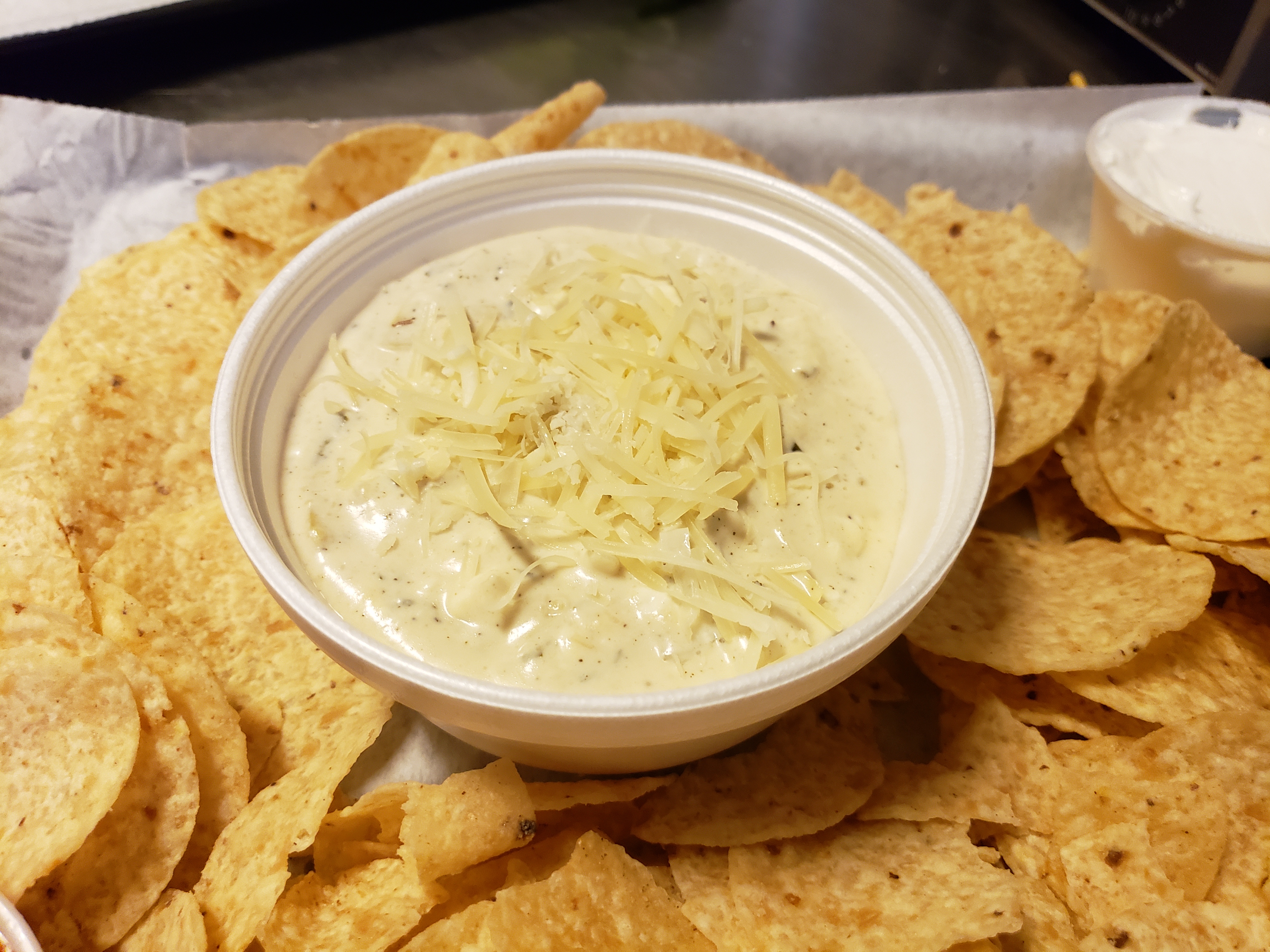 Order Spinach and Artichoke Dip food online from Bison Witches Bar & Deli store, Norman on bringmethat.com