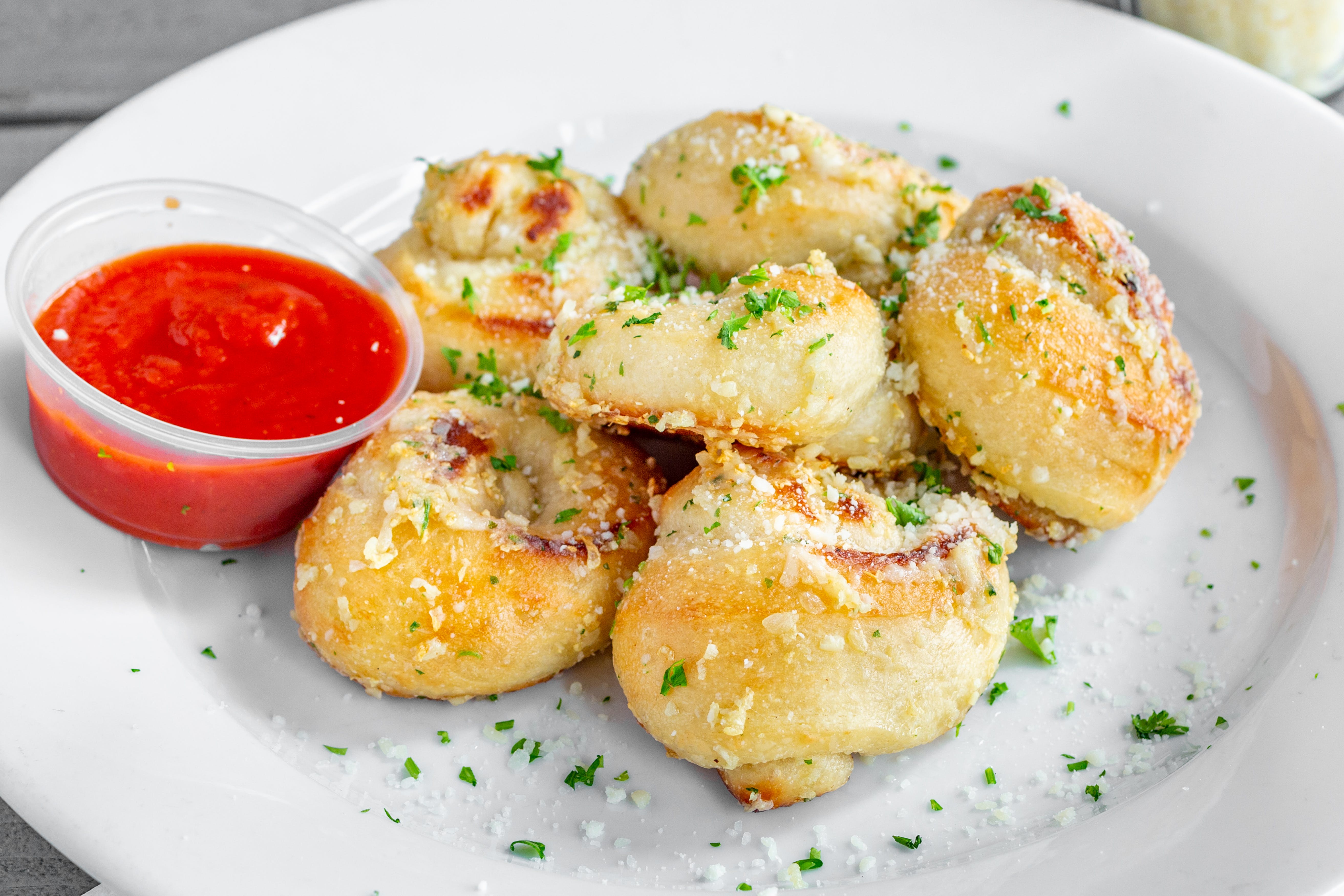 Order Garlic Knots with Cheese - 6 Pieces food online from Lax Pizza store, Los Angeles on bringmethat.com