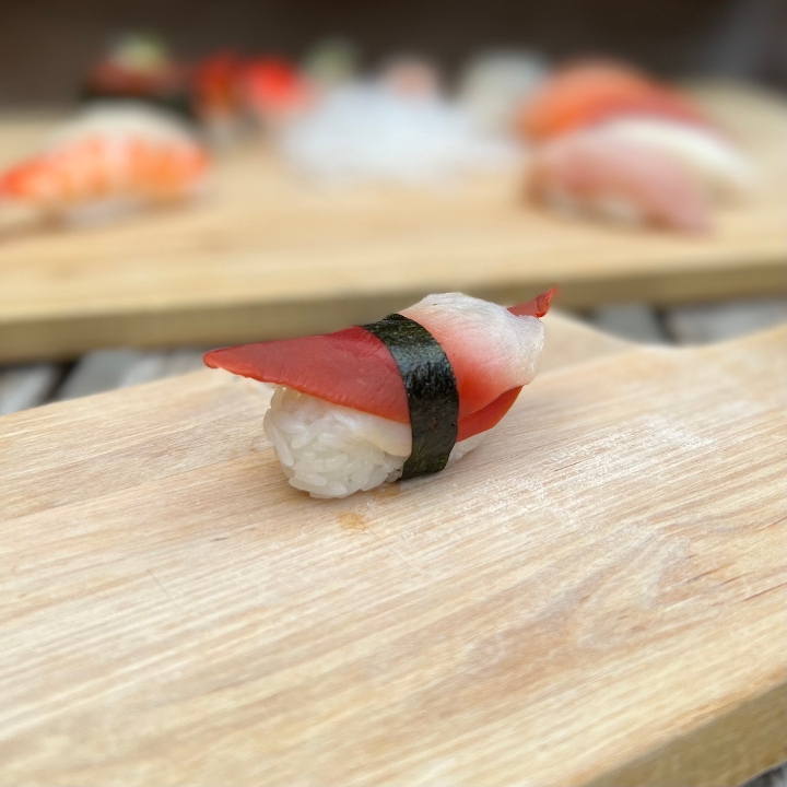 Order Hokkigai Nigiri food online from Tanuki sushi store, Chicago on bringmethat.com