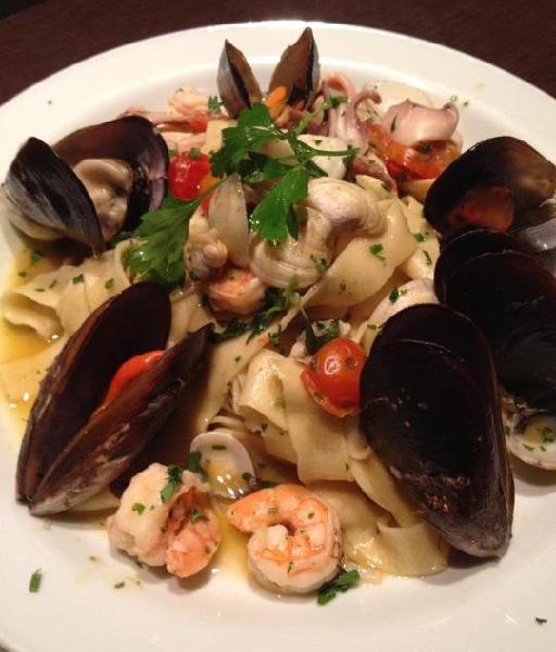Order Fettuccine Frutti Di Mare food online from Cybelles Pizza Restaurants store, Daly City on bringmethat.com