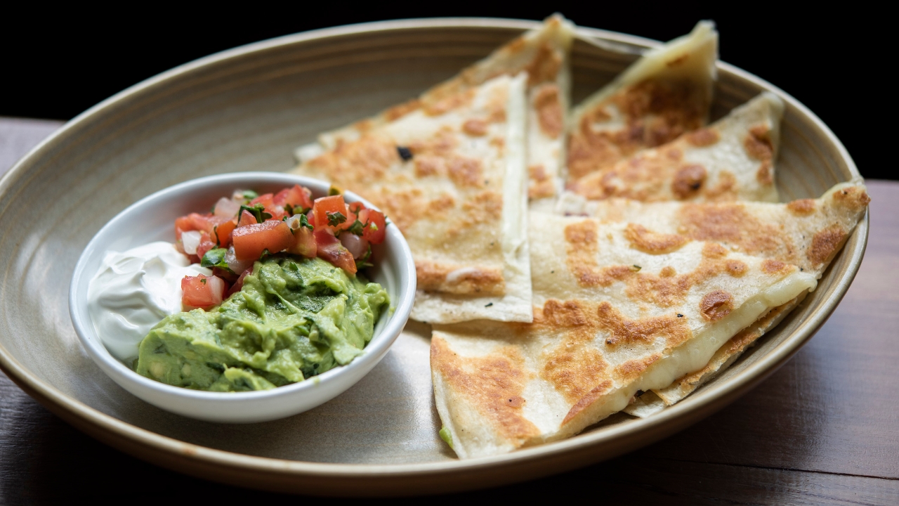 Order Cheese Quesadilla (Large) food online from Cactus Restaurant store, Seattle on bringmethat.com