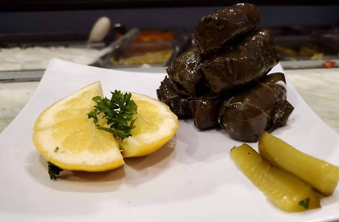 Order 6 pcs Dolmades food online from Phoenicia Cafe store, Gilbert on bringmethat.com