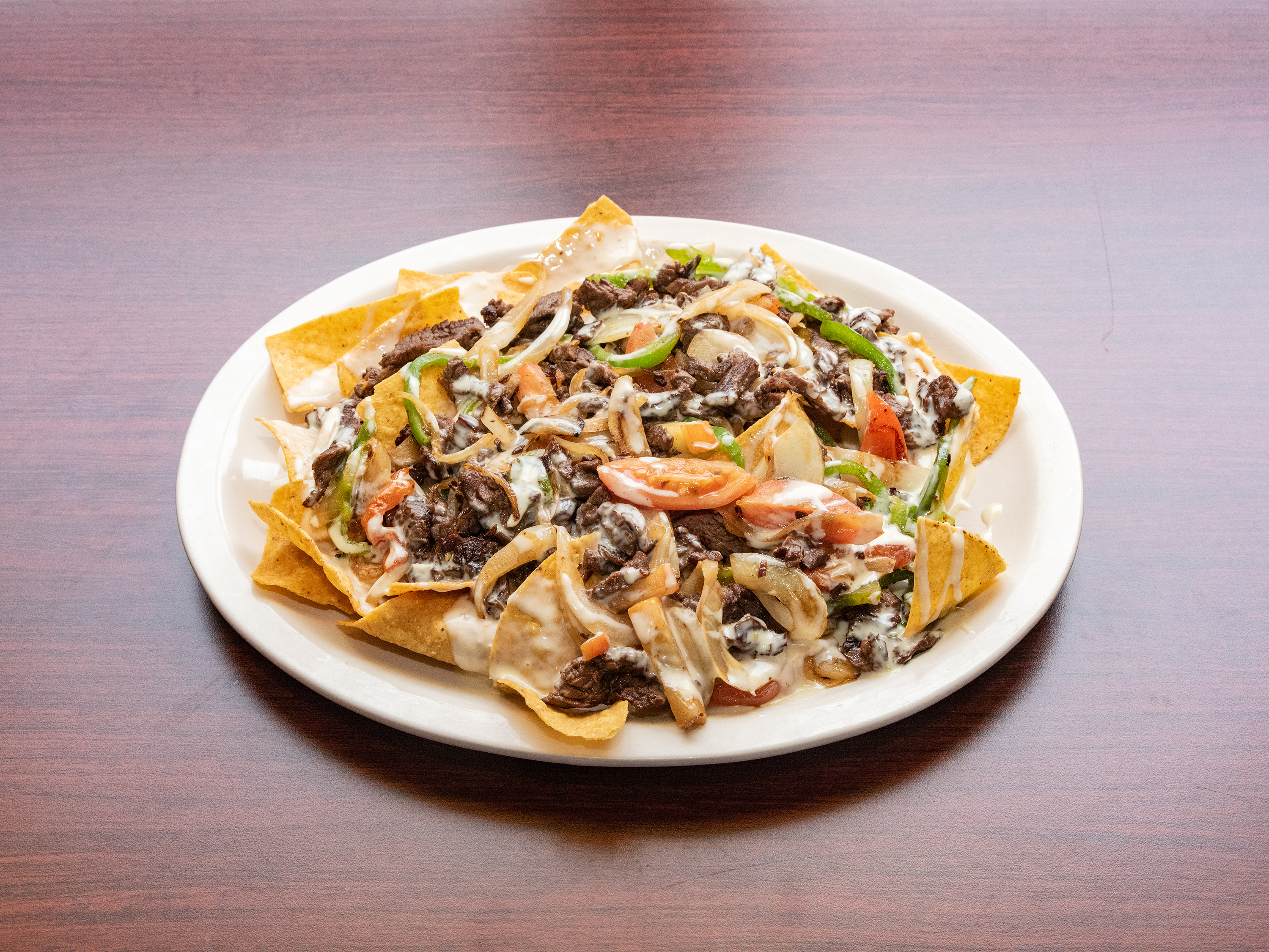 Order Nacho Fajita food online from El Nopal Mexican Restaurant store, Cedartown on bringmethat.com